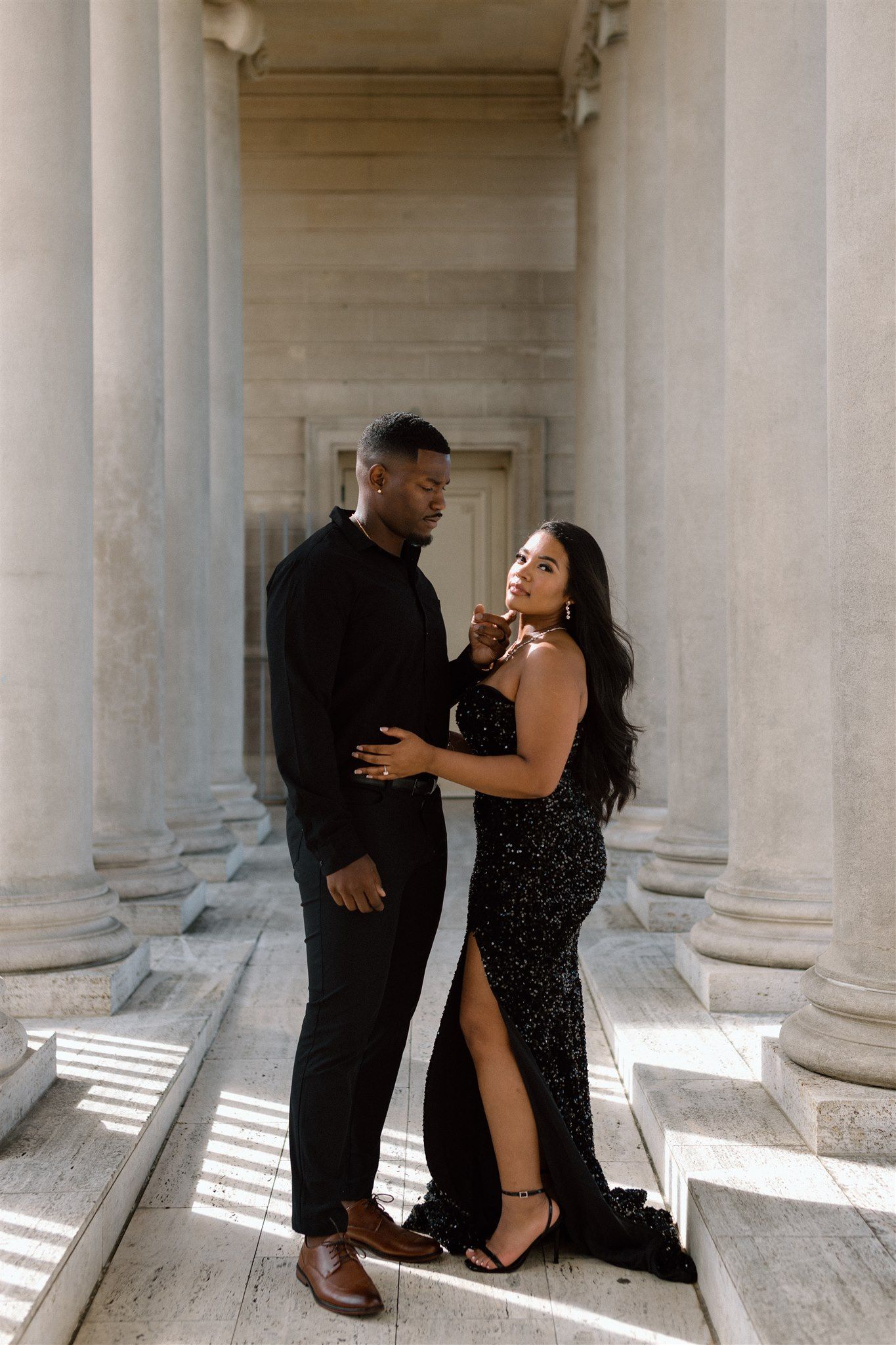 Couple posing for their engagement session at the Legion of Honor Museum in San Francisco, California, captured by Makayla Miranda Photo