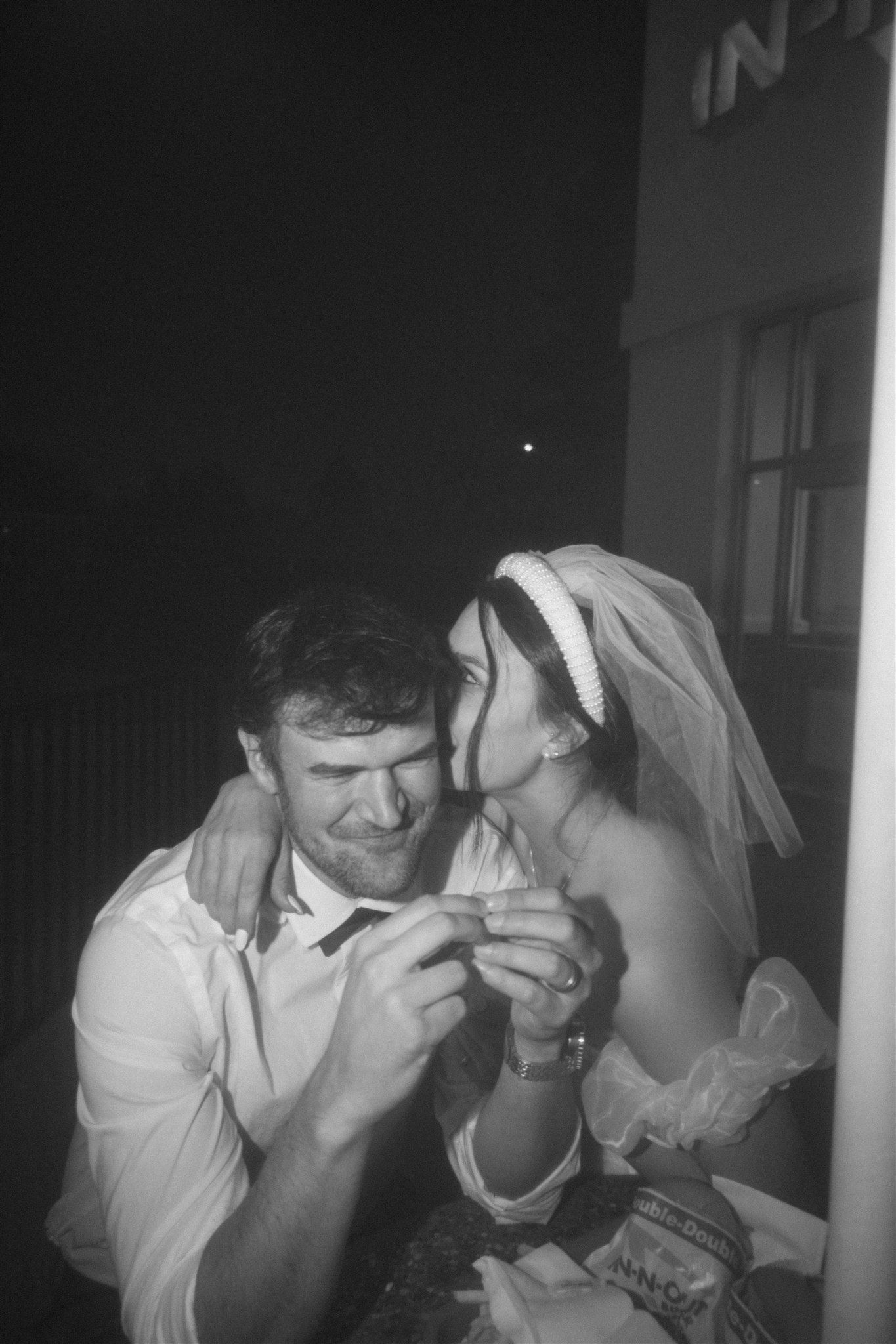Couple enjoying a fun elopement-style session at In-N-Out, captured by Makayla Miranda Photography.