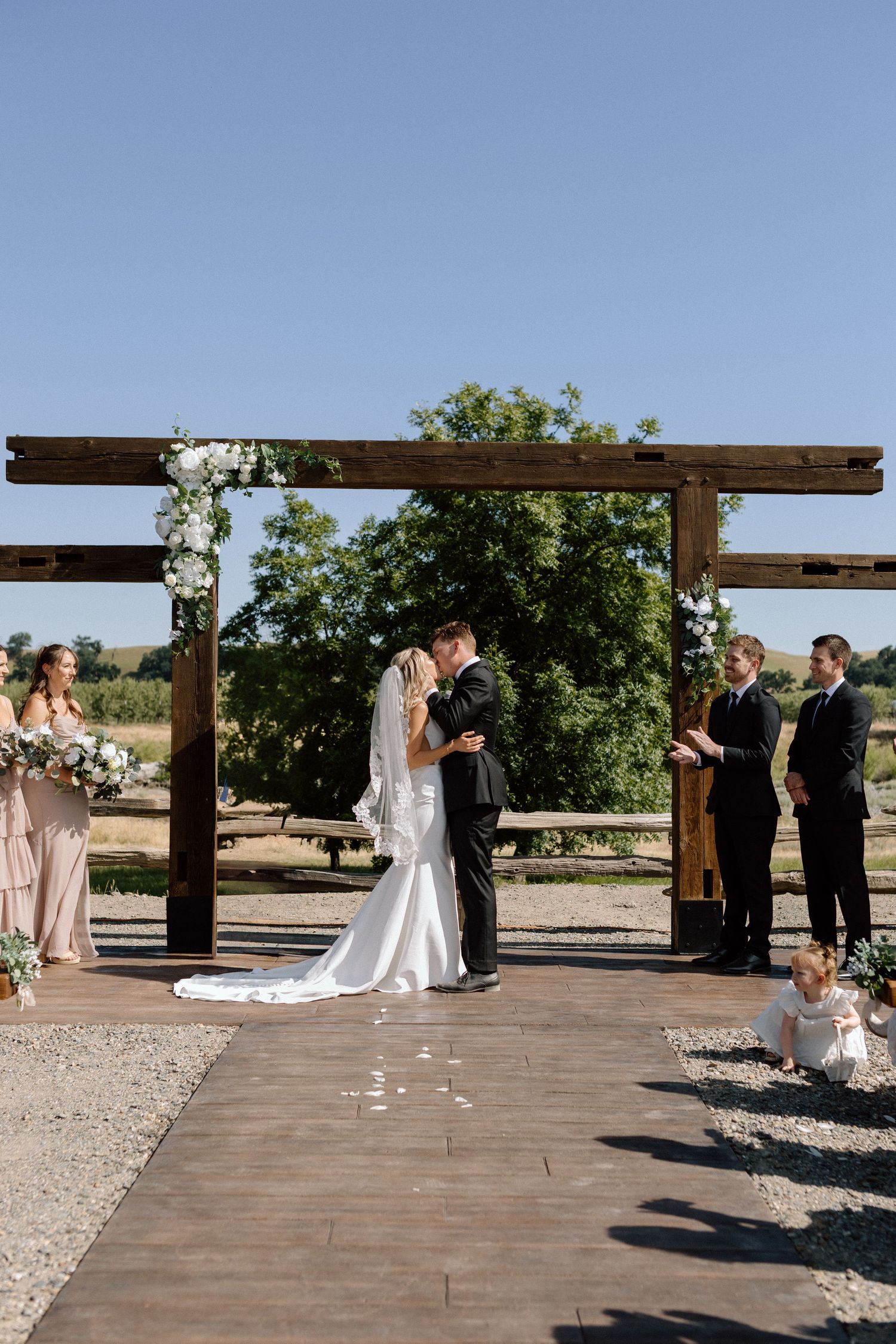 Couple on wedding day Cottonwood, California, captured by Makayla Miranda Photo.
