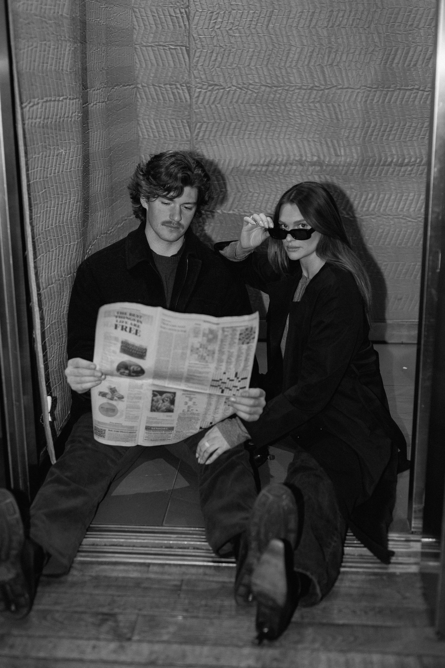Couples session in elevator in Minneapolis, Minnesota. Captured by Makayla Miranda Photo.