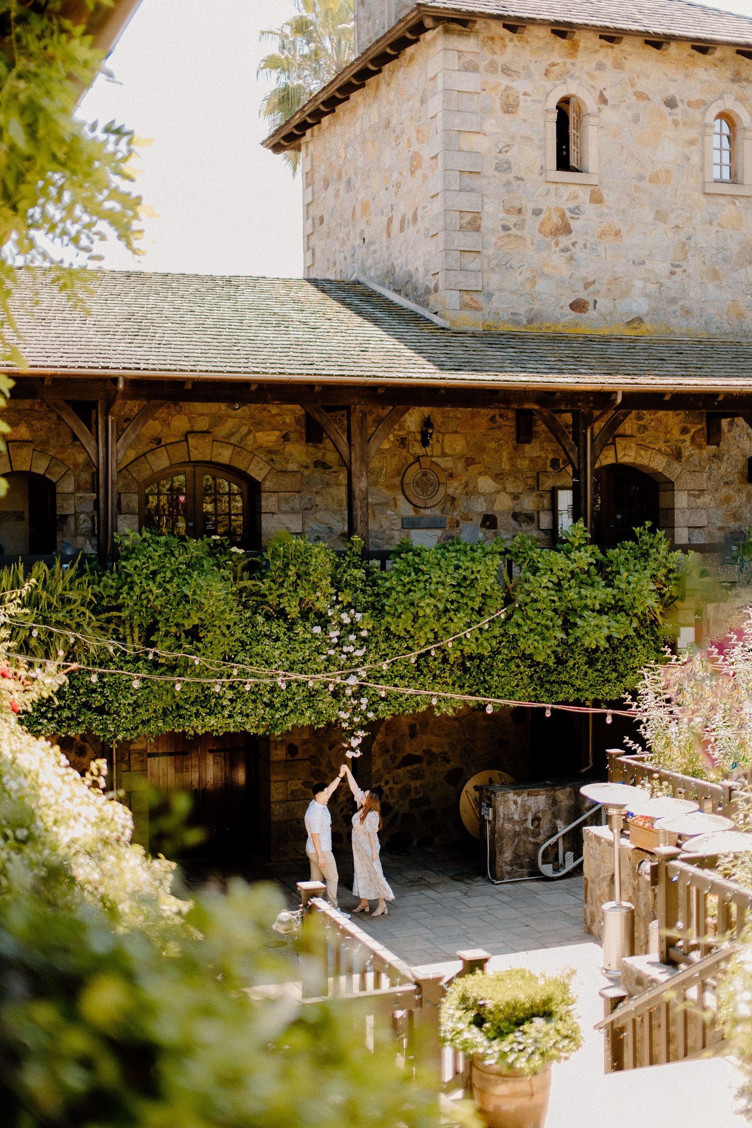 Romantic engagement portraits at V. Sattui Winery in Napa Valley, California.