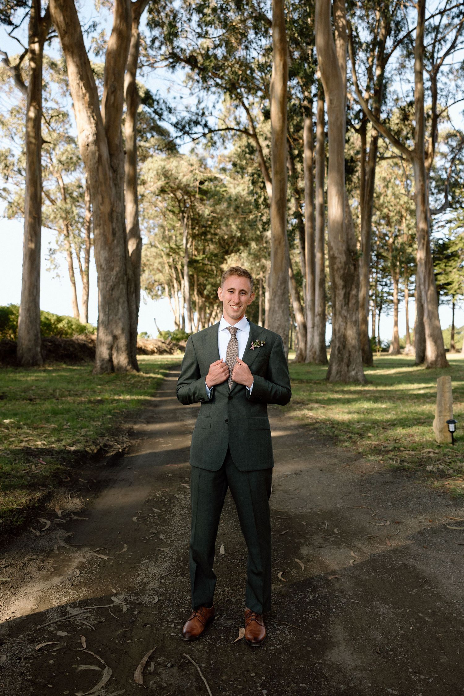 Groom on wedding day at Spring Ranch in Mendocino, California, captured by Makayla Miranda Photo