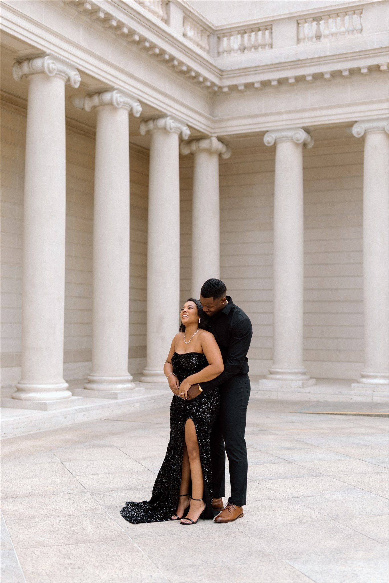 Couple posing for their engagement session at the Legion of Honor Museum in San Francisco, California, captured by Makayla Miranda Photo