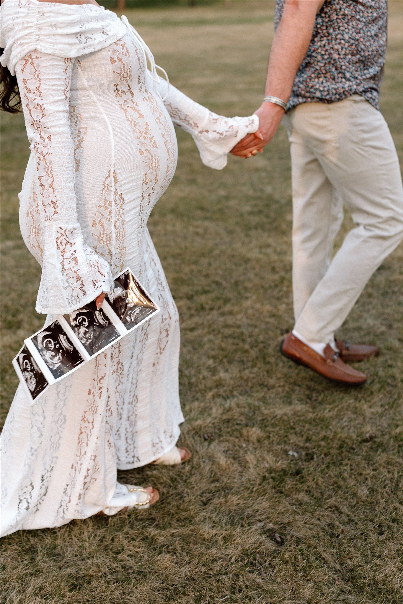 Expecting couple during a maternity session along the Mississippi River in Minnesota, captured by Makayla Miranda Photo.