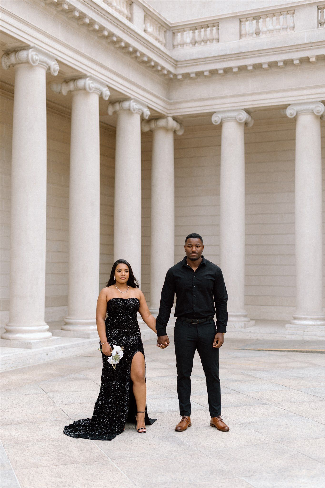 Couple posing for their engagement session at the Legion of Honor Museum in San Francisco, California, captured by Makayla Miranda Photo