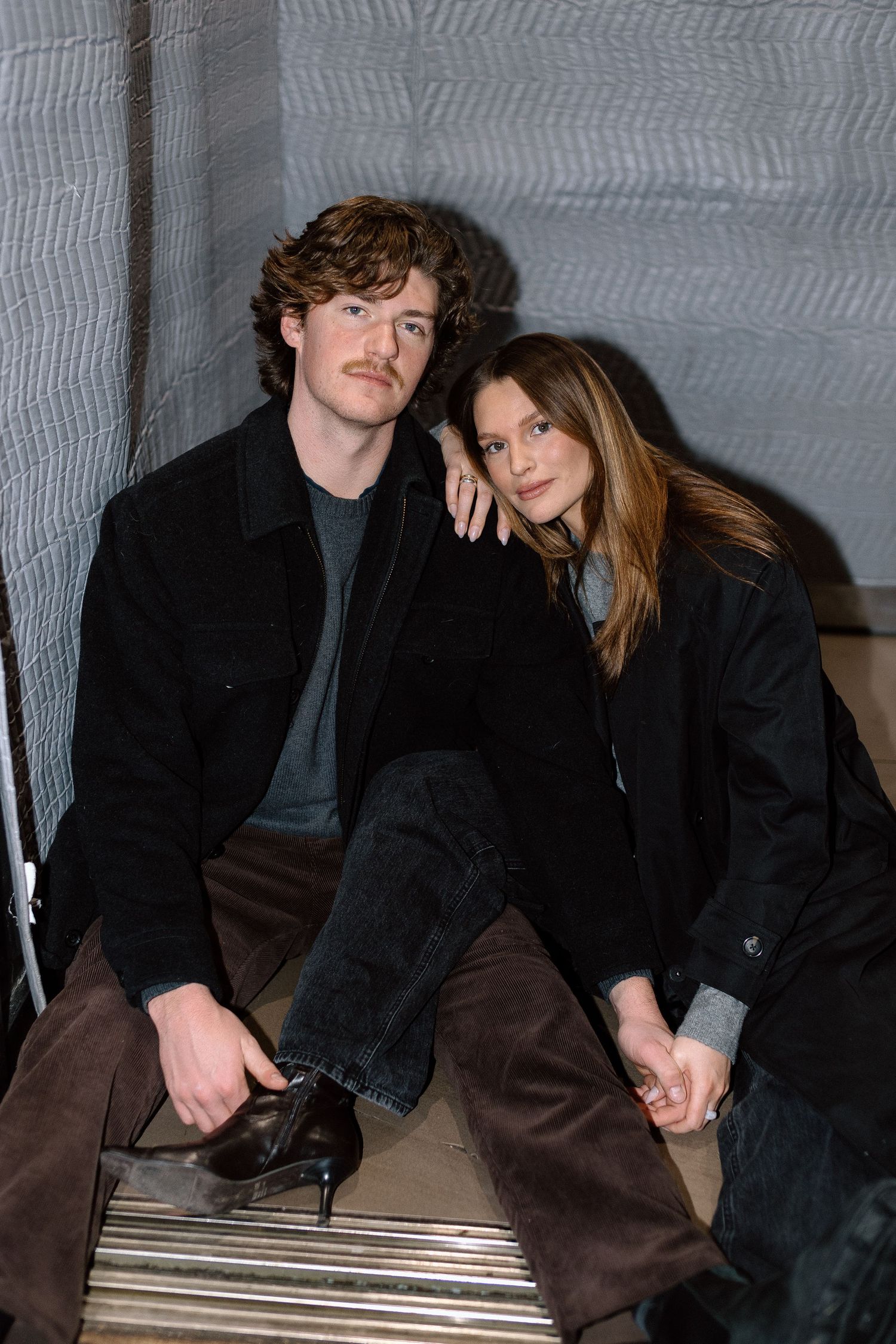Couples session in elevator in Minneapolis, Minnesota. Captured by Makayla Miranda Photo.