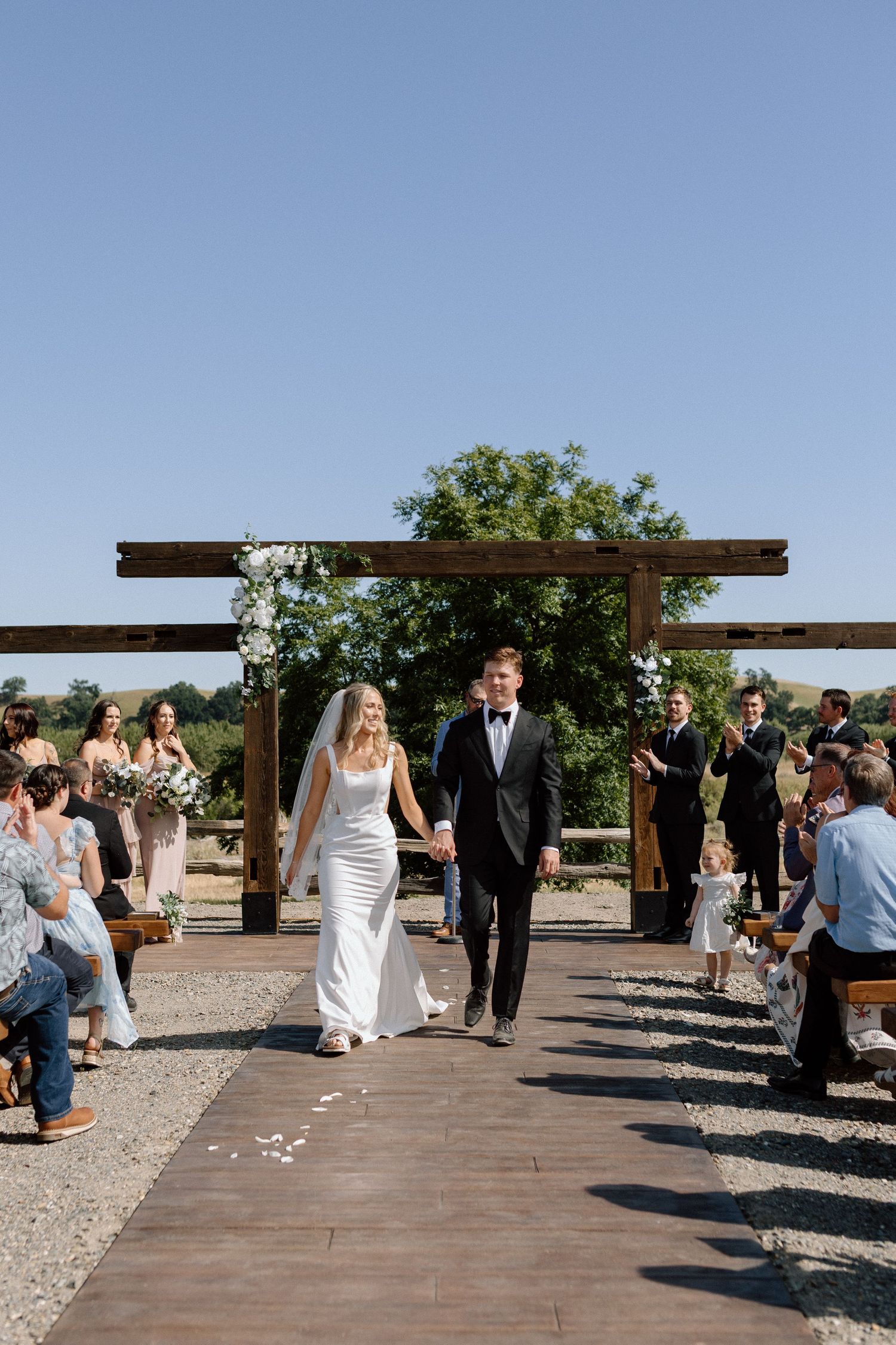 Couple on wedding day Cottonwood, California, captured by Makayla Miranda Photo.