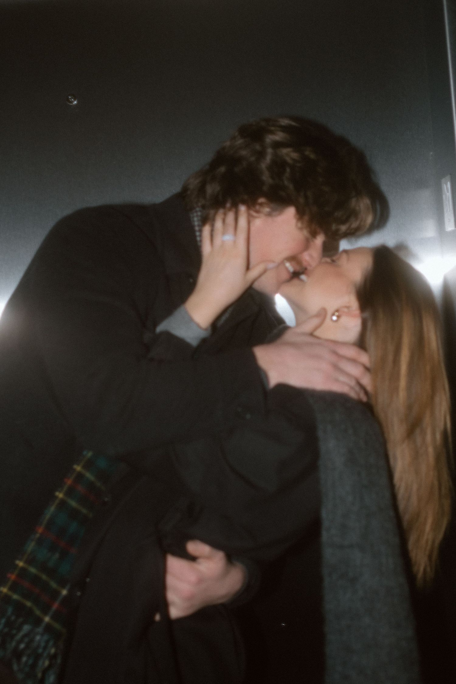 Couples session in elevator in Minneapolis, Minnesota. Captured by Makayla Miranda Photo.
