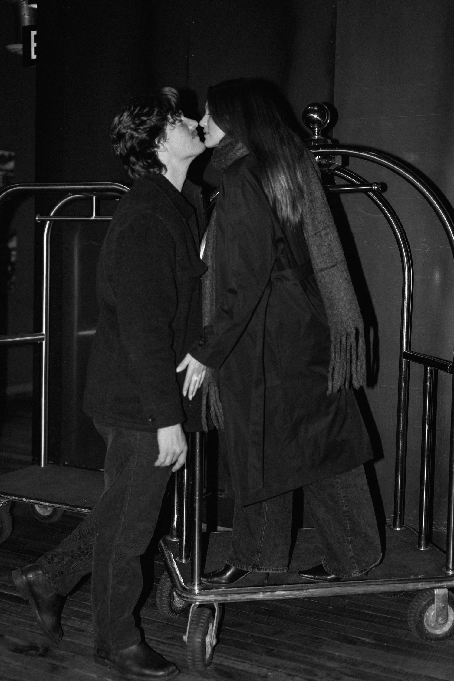 Couples session in elevator in Minneapolis, Minnesota. Captured by Makayla Miranda Photo.