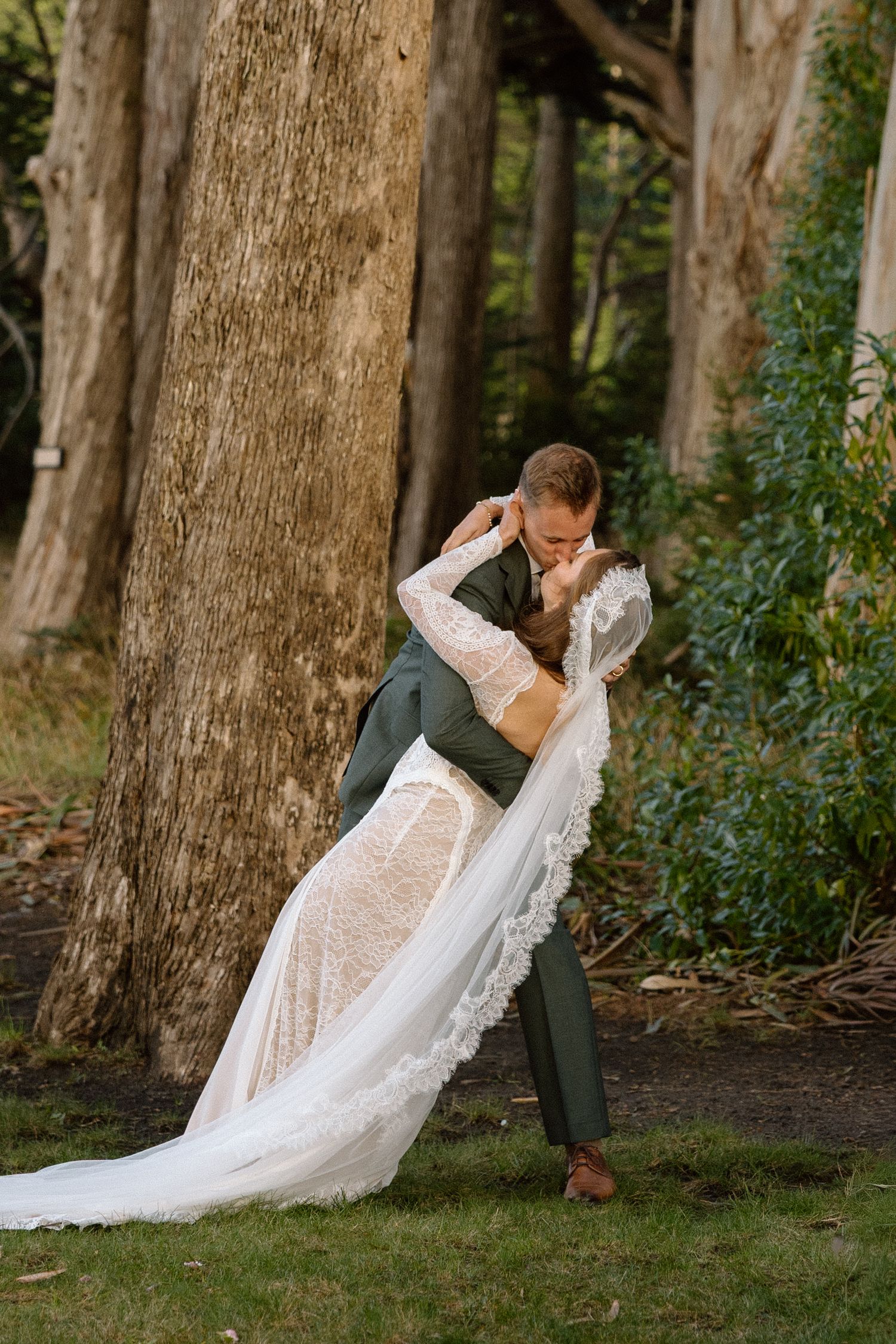 First kiss on wedding day at Spring Ranch in Mendocino, California, captured by Makayla Miranda Photo