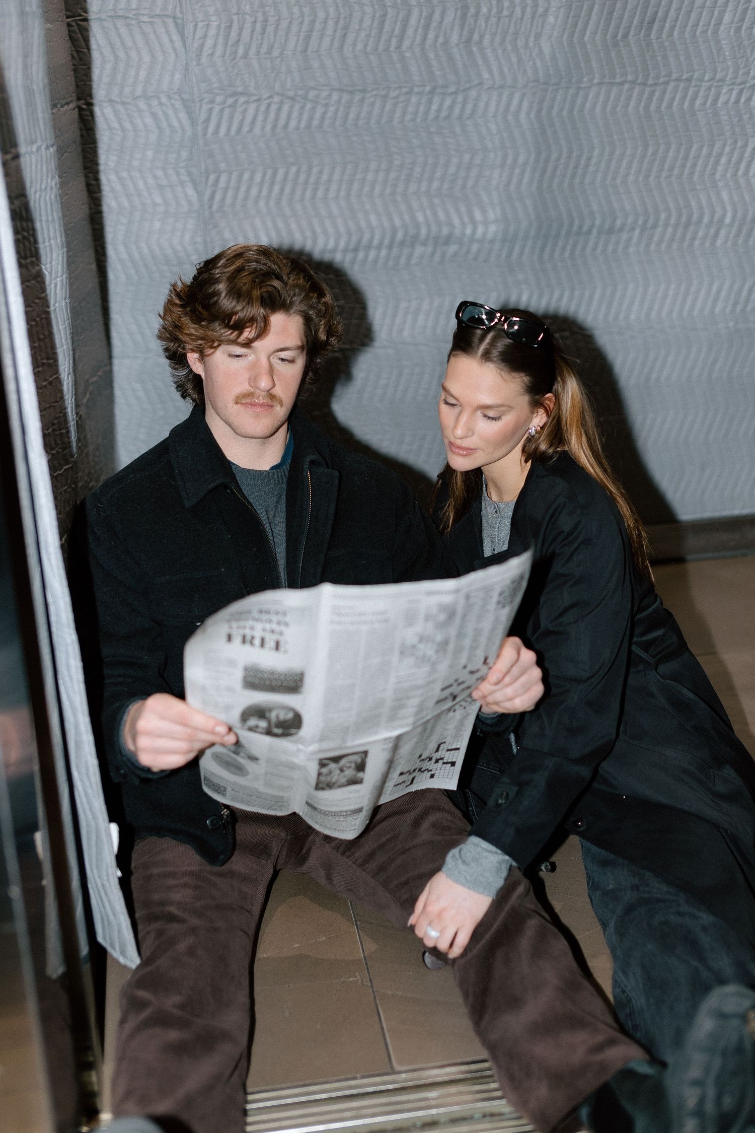 Couples session in elevator in Minneapolis, Minnesota. Captured by Makayla Miranda Photo.