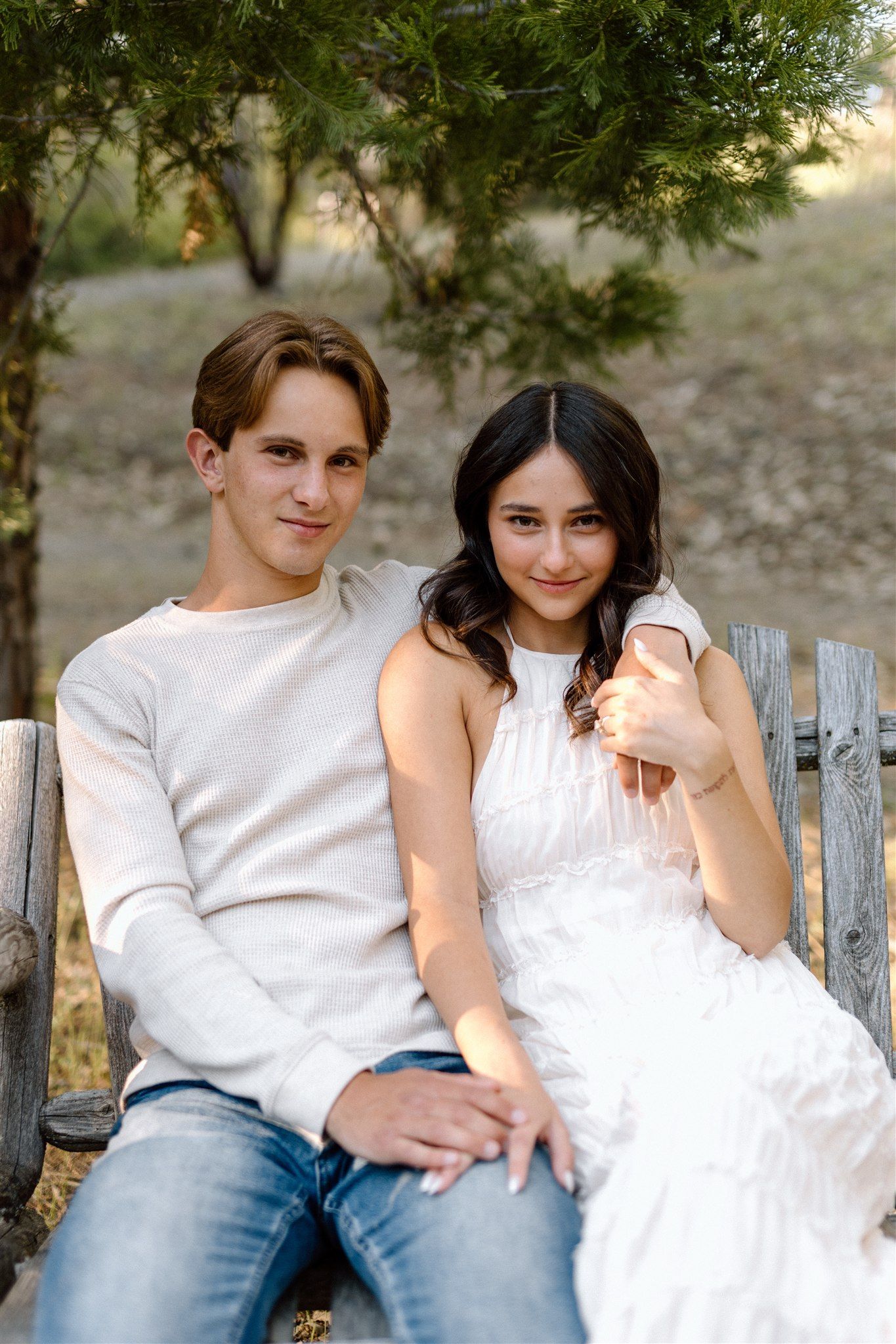 Couple posing for their engagement session outdoors in Lassen, Northern California, captured by Makayla Miranda Photo.
