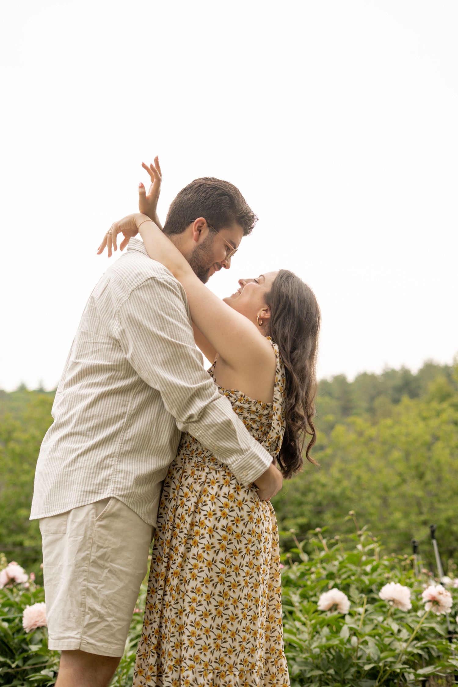 Couples portrait season among the peony fields at Nicewicz Farm in Bolton, MA