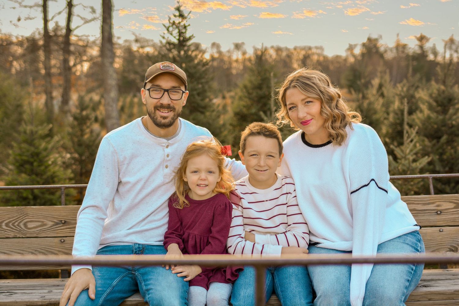 family holiday mini session. photography Christmas card session at Christmas tree farm in Central Massachusetts