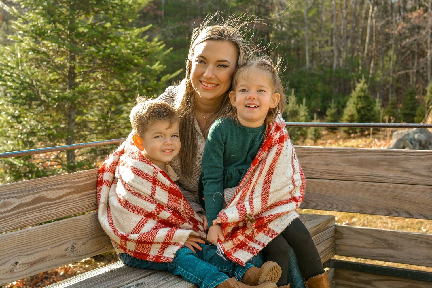 family holiday mini session. photography Christmas card session at Christmas tree farm in Central Massachusetts