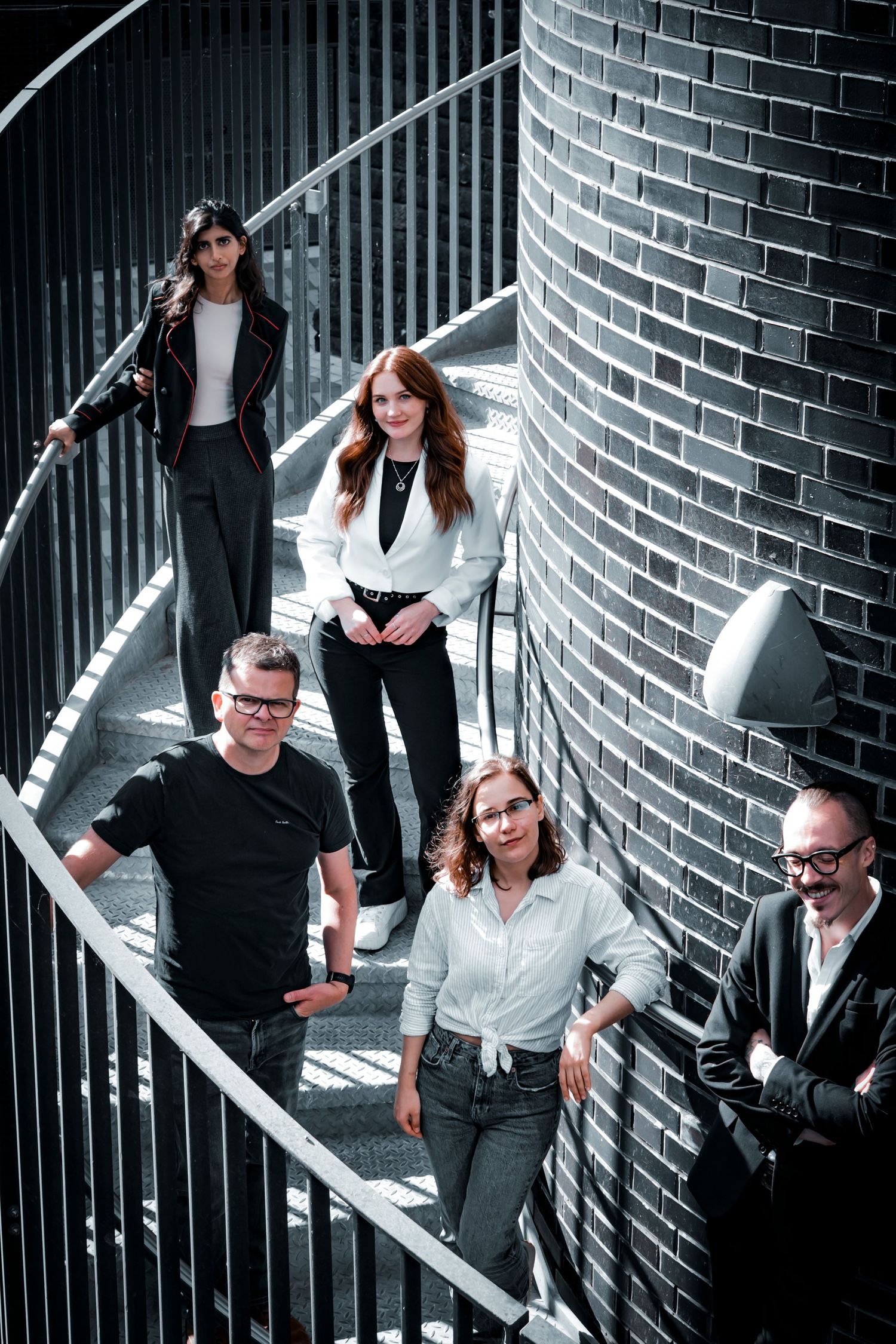 Professional portrait of business consultants in an interesting architectural setting
