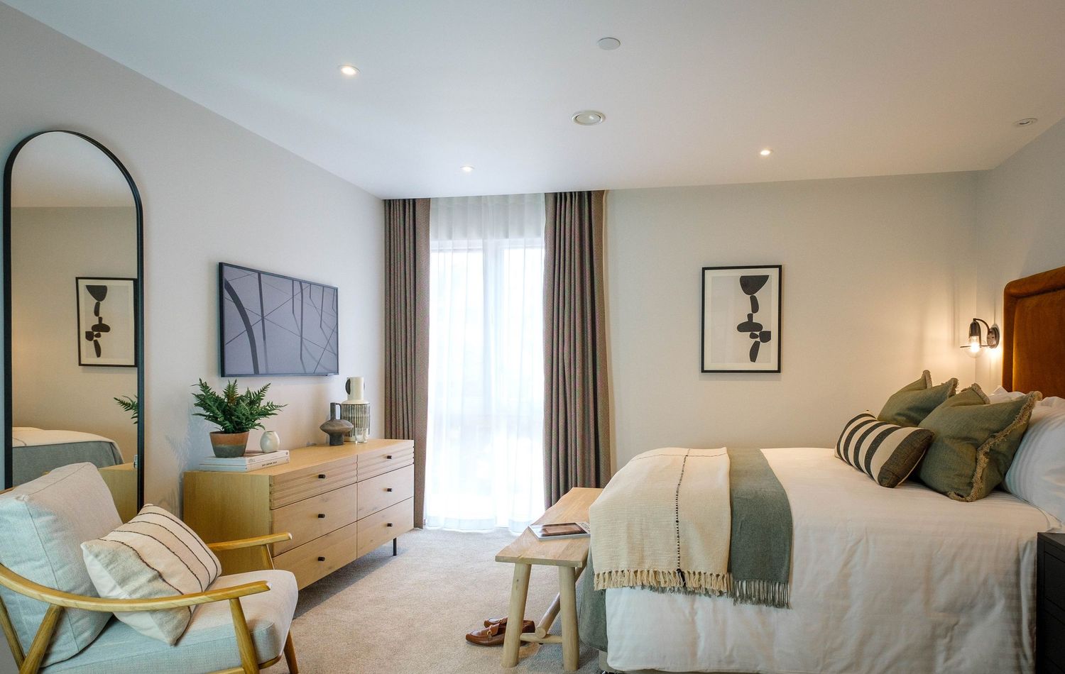 Interior photograph of boutique hotel lounge in Manchester, showcasing warm textures and atmosphere