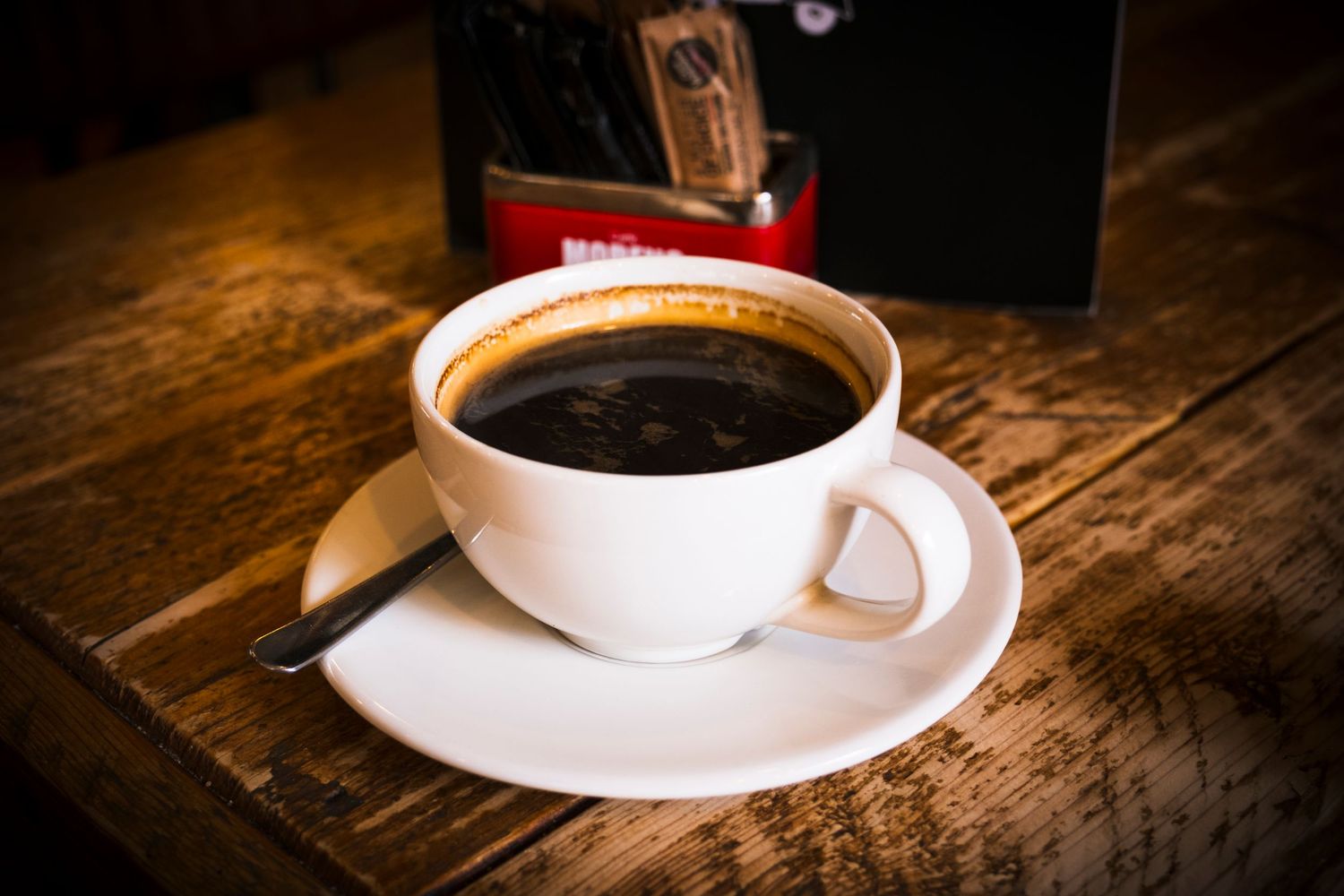 Food photograph of a delicious cup of coffee in Sheffield bar, styled to highlight colour and atmosphere
