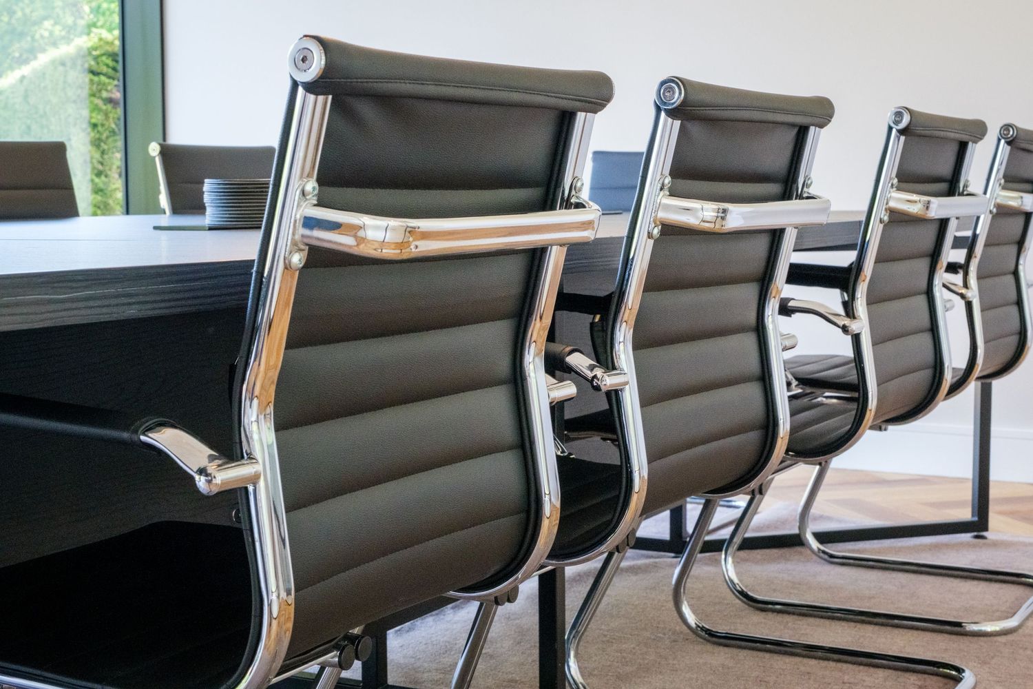 Interior photograph of a boardroom in Leeds, showcasing the design of the interior and showcasing the Charles Eames chairs