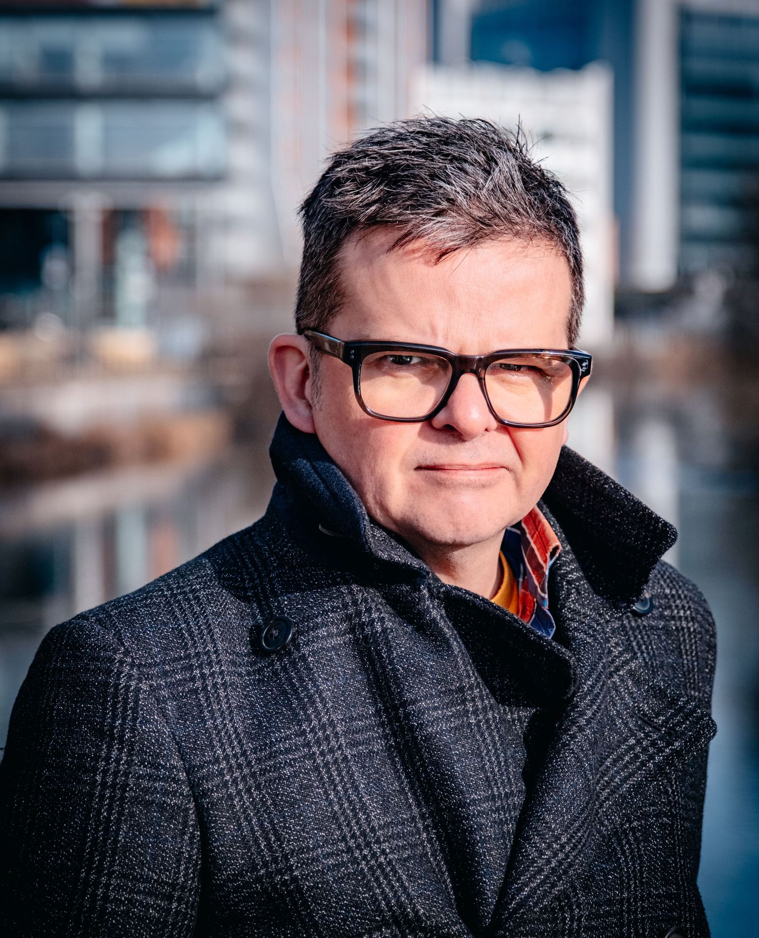 Professional portrait of Richard Michie in Leeds Dock, photographed for branding and marketing