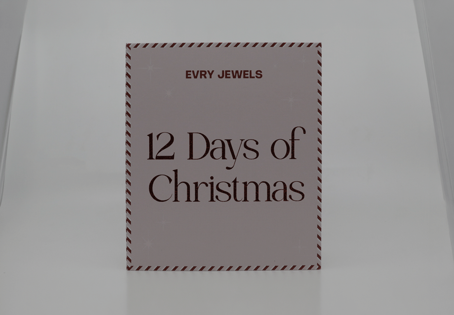 Evry Jewels 12 Days of Christmas advent calendar box with elegant minimalist pink and white design.