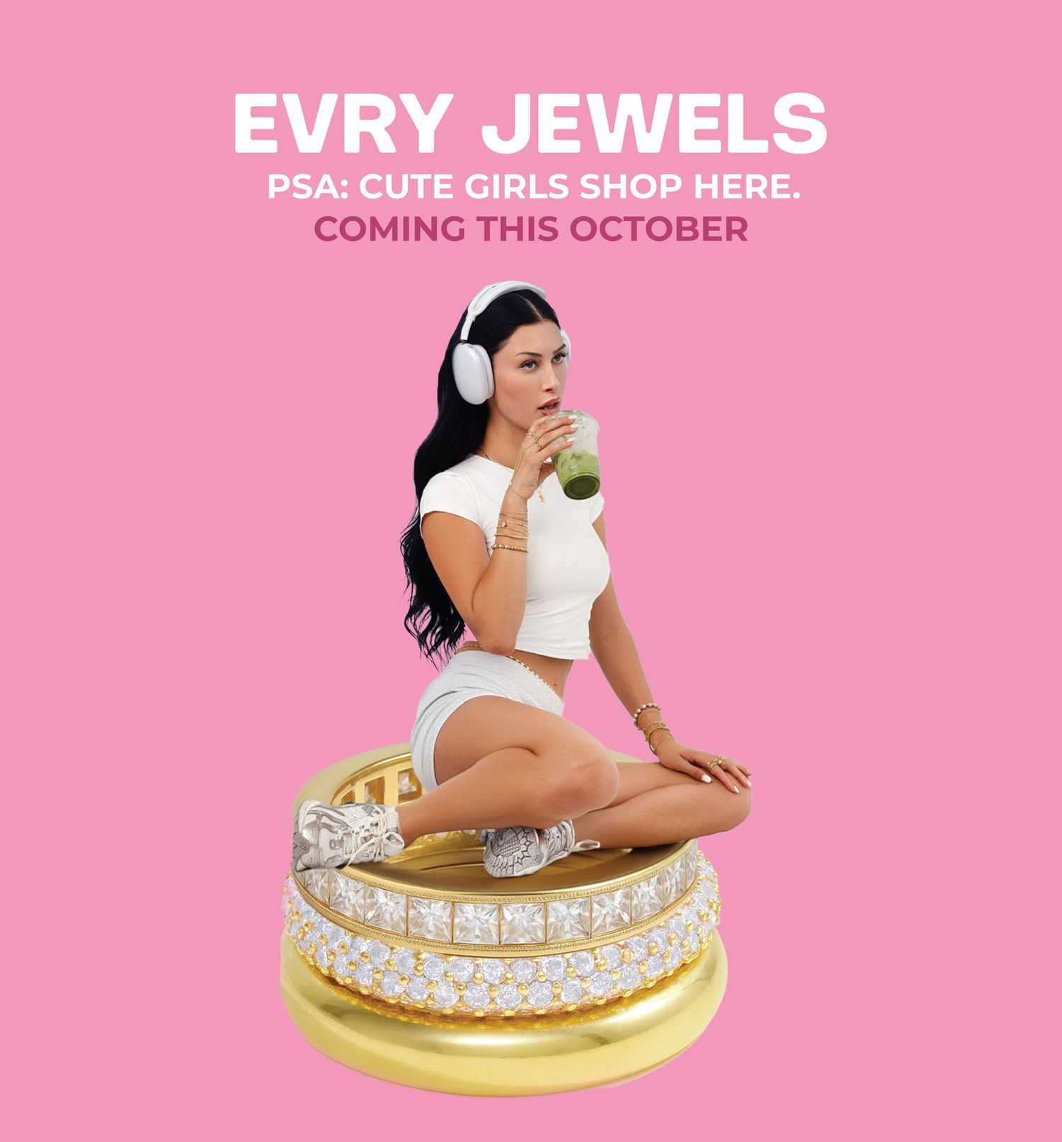 Pink promotional ad for Evry Jewels featuring a woman sitting on diamond gold rings, wearing white outfit and headphones.