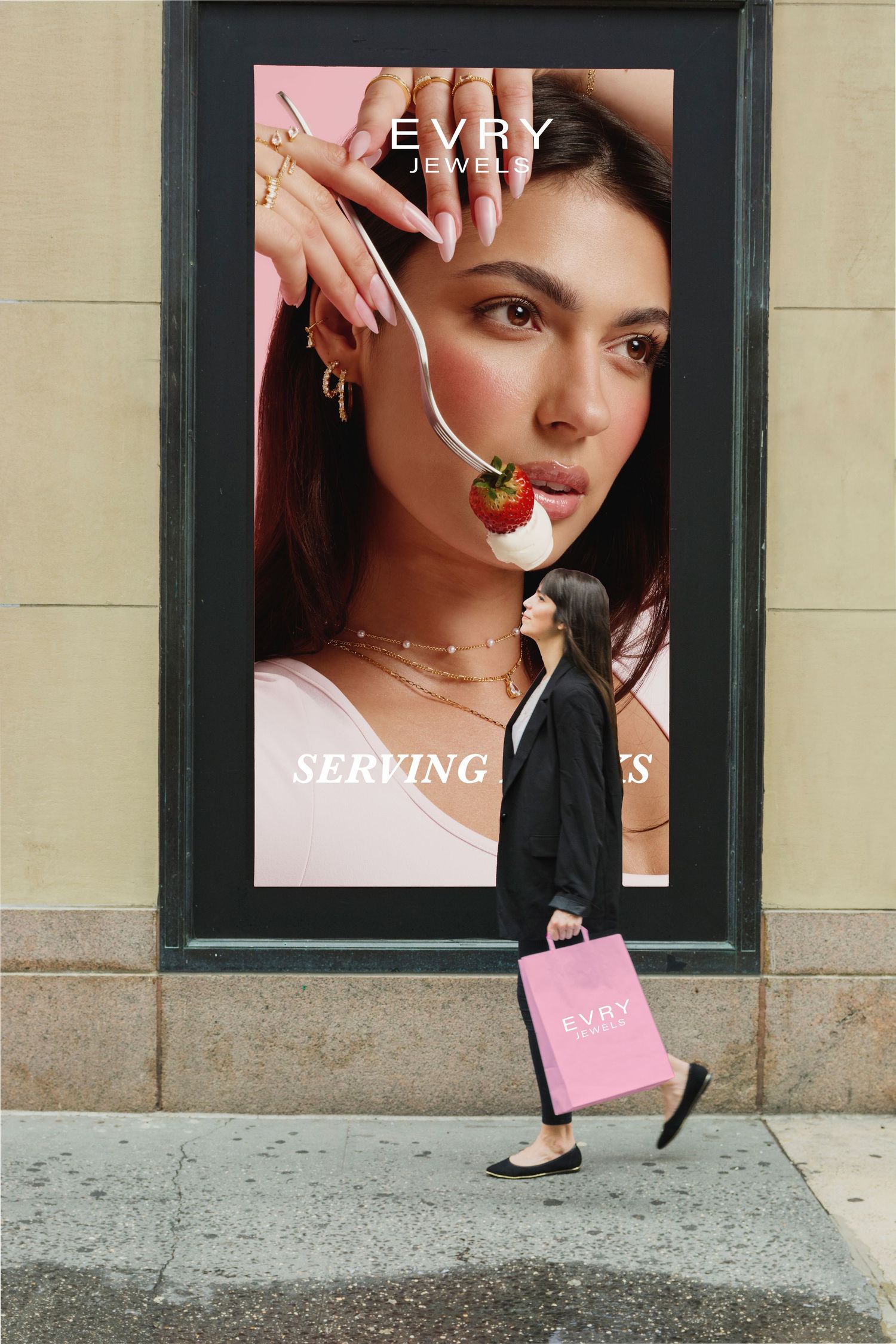 Evry Jewels outdoor billboard ad showing a woman with jewelry eating a strawberry, with shopper walking past.