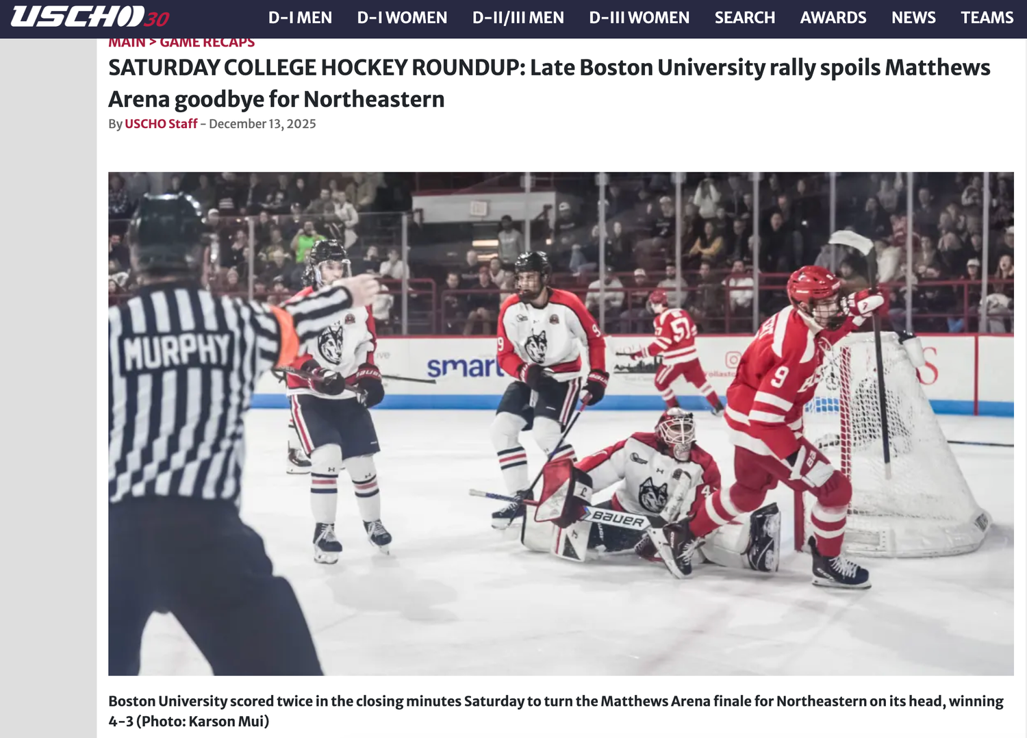 Boston University players celebrate a late comeback victory over Northeastern at Matthews Arena in a college hockey game.
