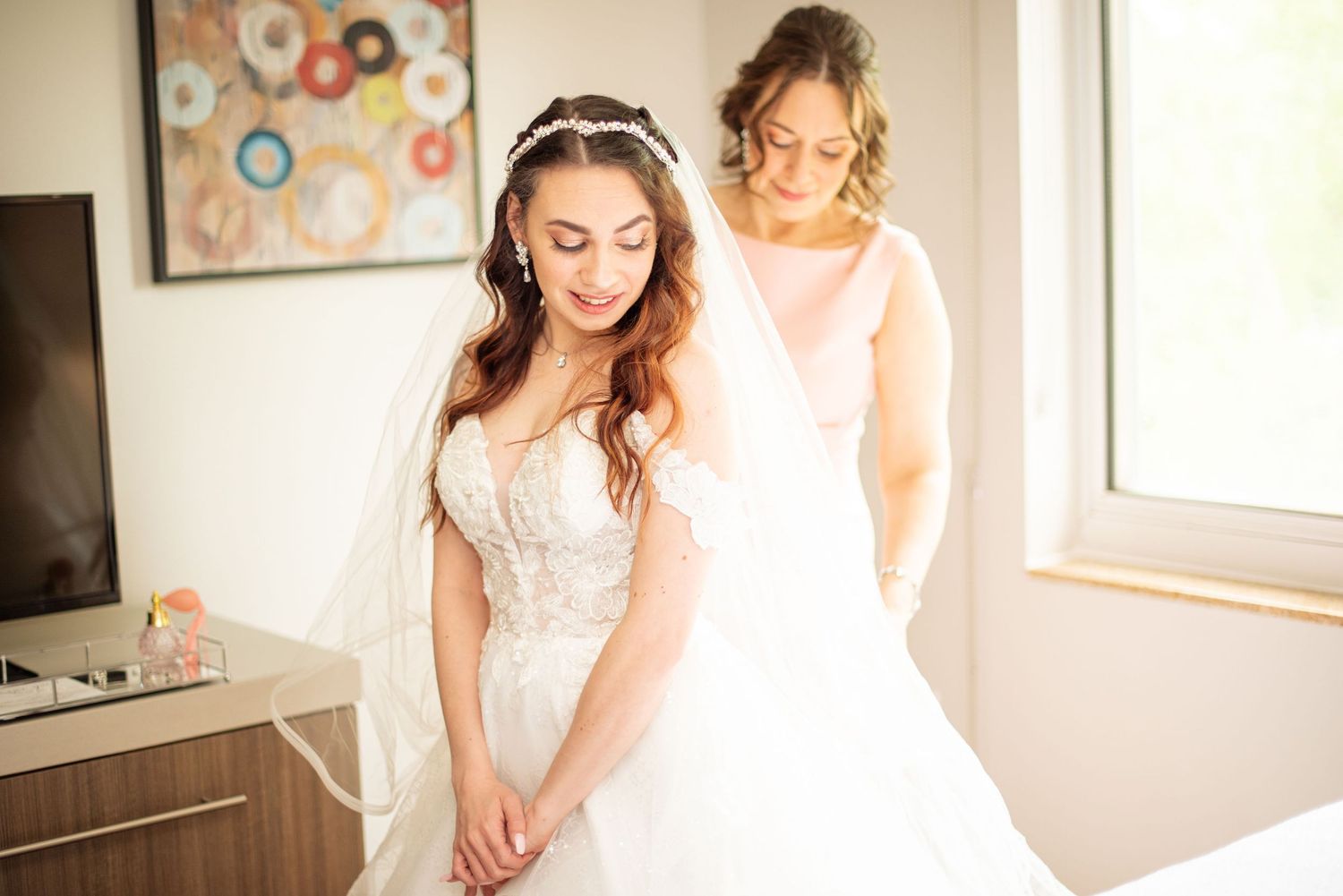 A series of wedding preparation photos showing a bride getting ready in a sunlit room with white decor by FBM Studios in Ft Lauderdale Fl.