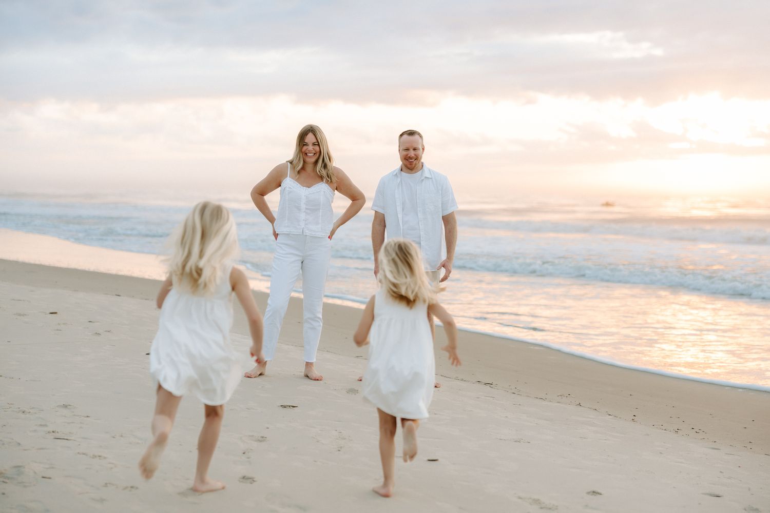 Family photography session at Hilton Head Island beach during sunrise