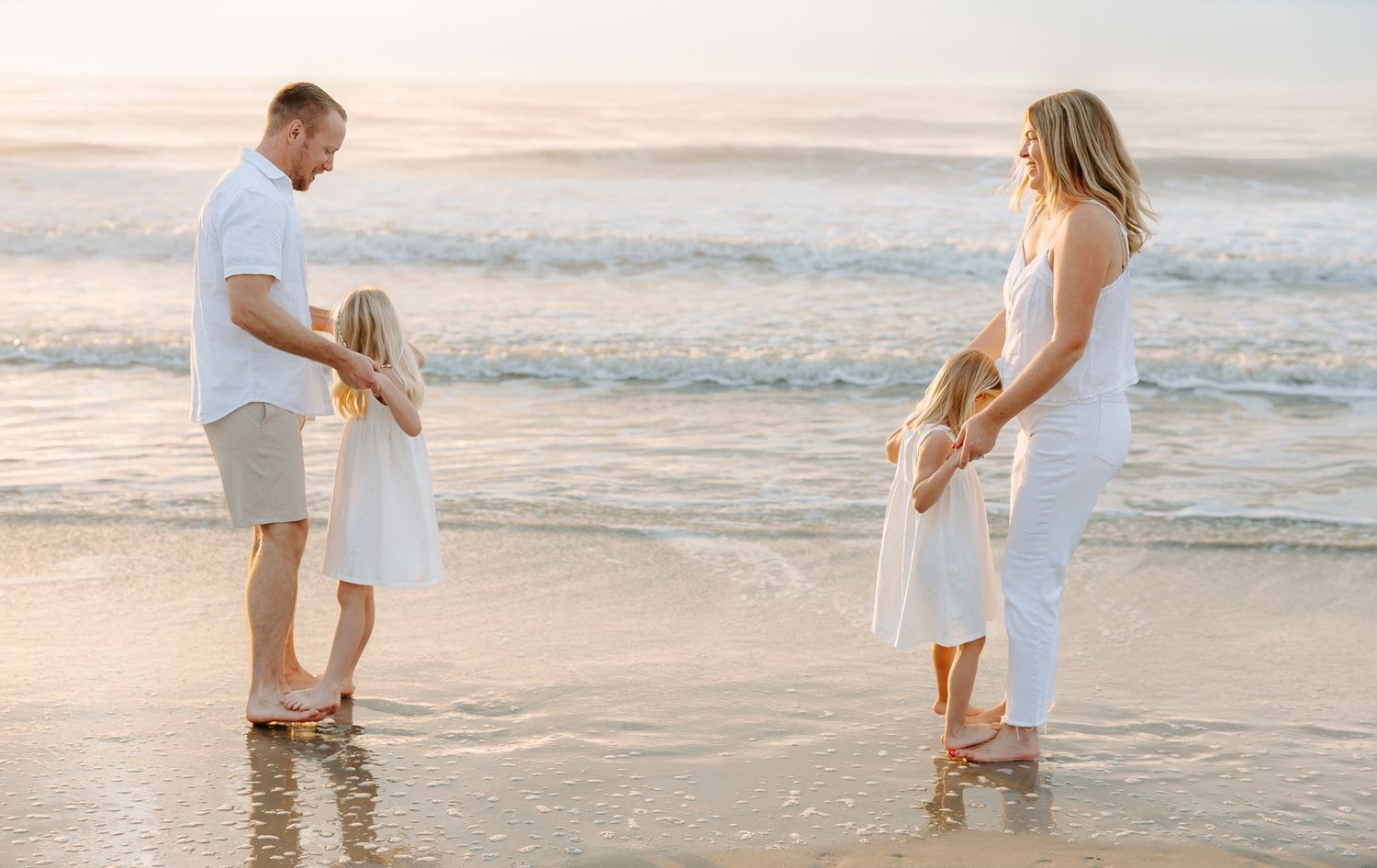 Family photography session at Hilton Head Island beach during sunrise
