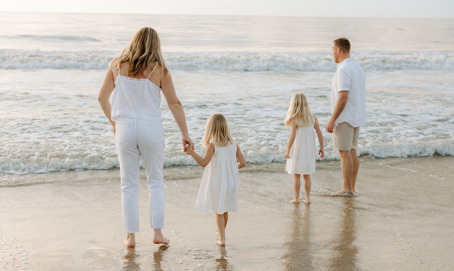 Family photography session at Hilton Head Island beach during sunrise