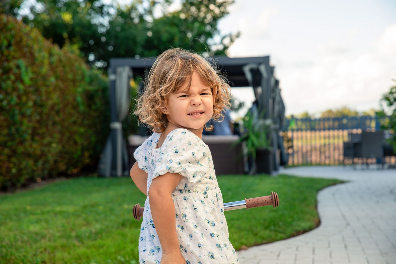 Little girl smiling during a family outdoor photography session in South Florida