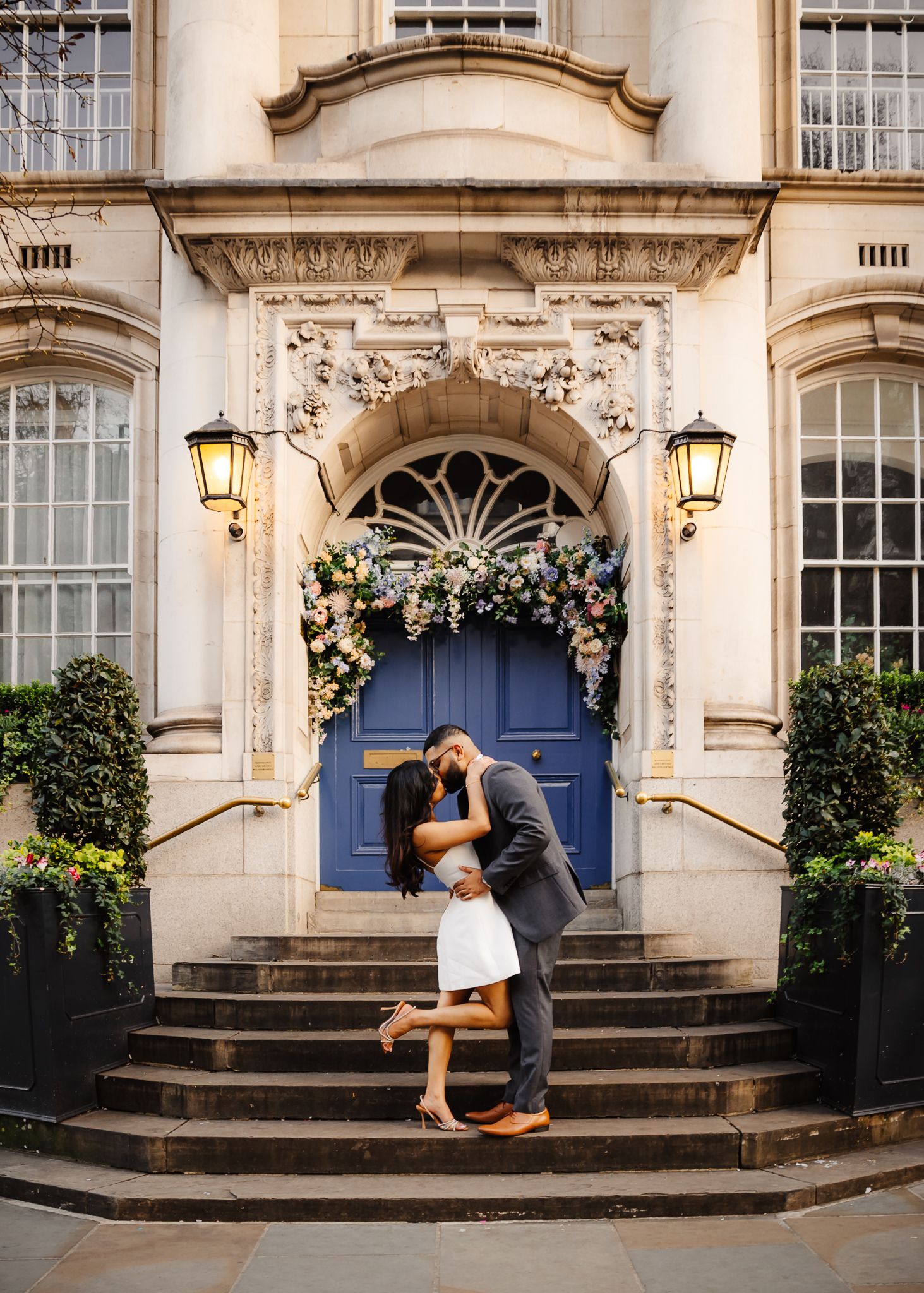 A sequence of images showing a romantic proposal scene on elegant stone steps with a blue door and lanterns.
