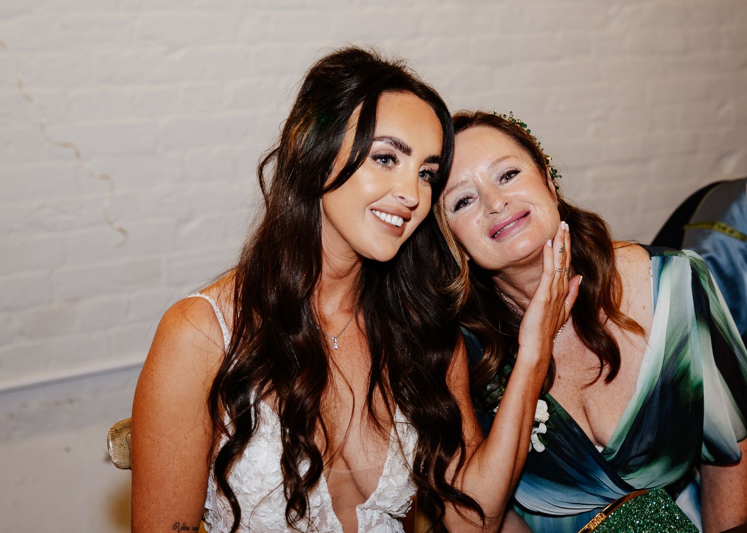 A series of candid photos showing two people laughing and embracing in a casual indoor setting.