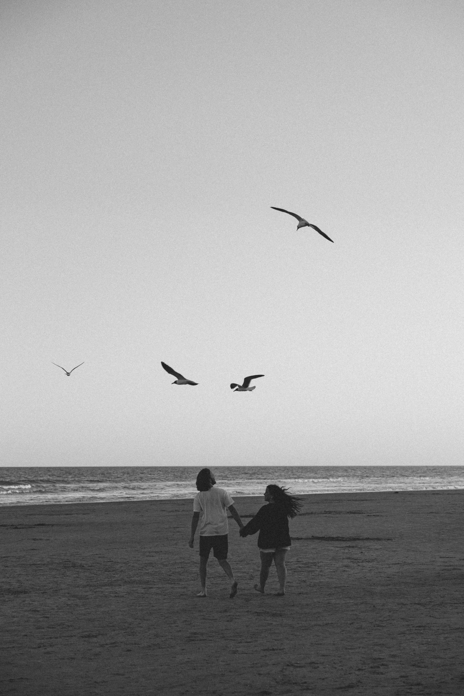 Couples Photoshoot at Folley beach in Charleston, South Carolina, Cinematic Couples Photographer, Beach Engagement Photos