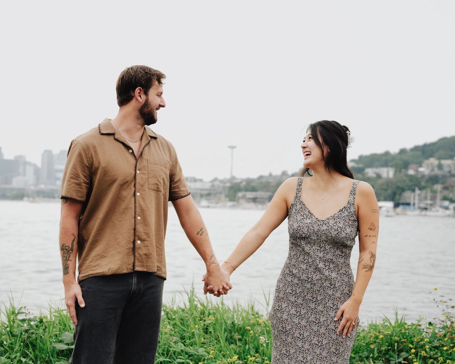 Moody engagement photos in Seattle, Washington at Gas Works Park on a foggy morning with film.