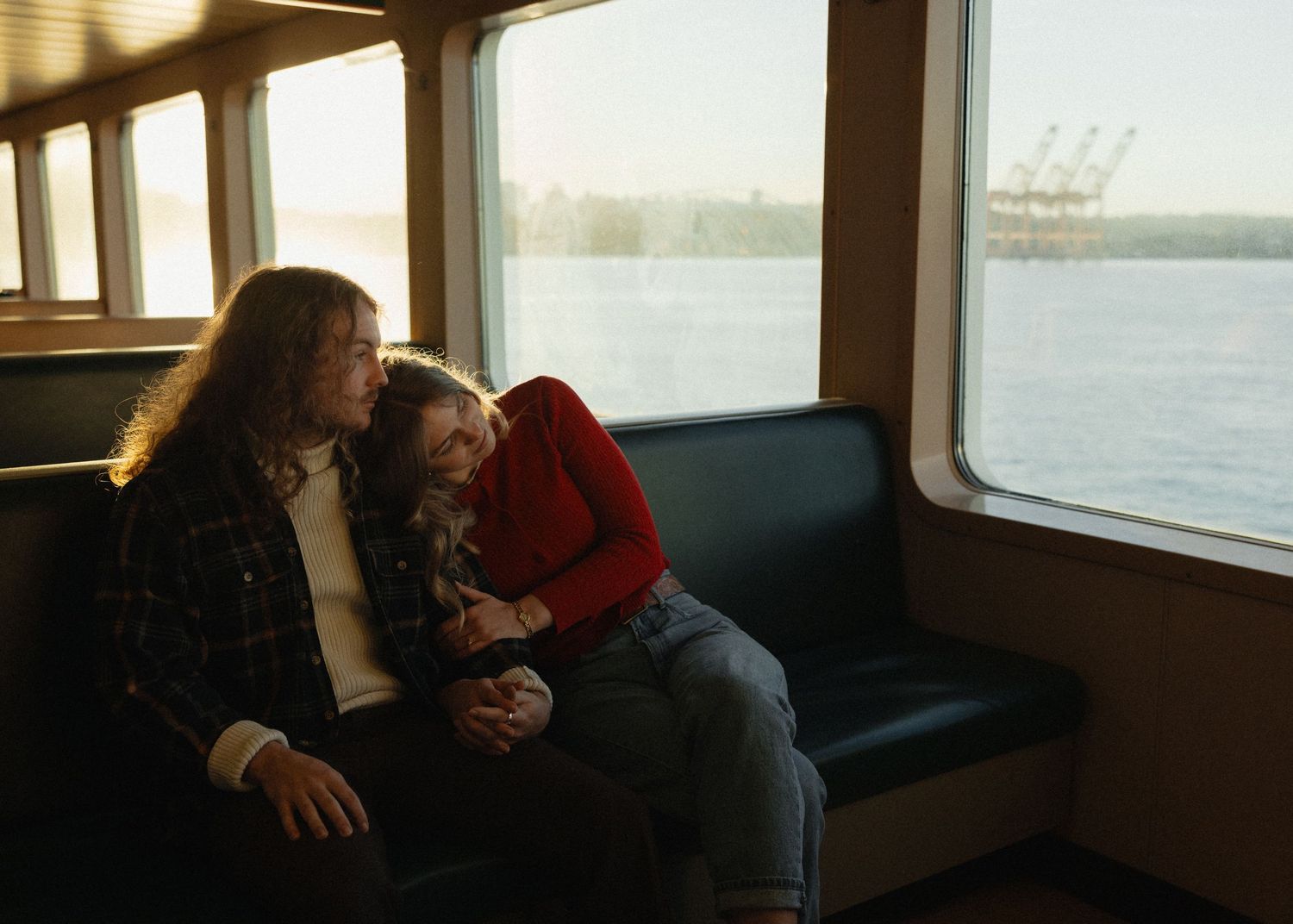 Dreamy engagement photos by Carlyns Photos on the Seattle Ferry during sunrise on our way to the Olympic National Forest.