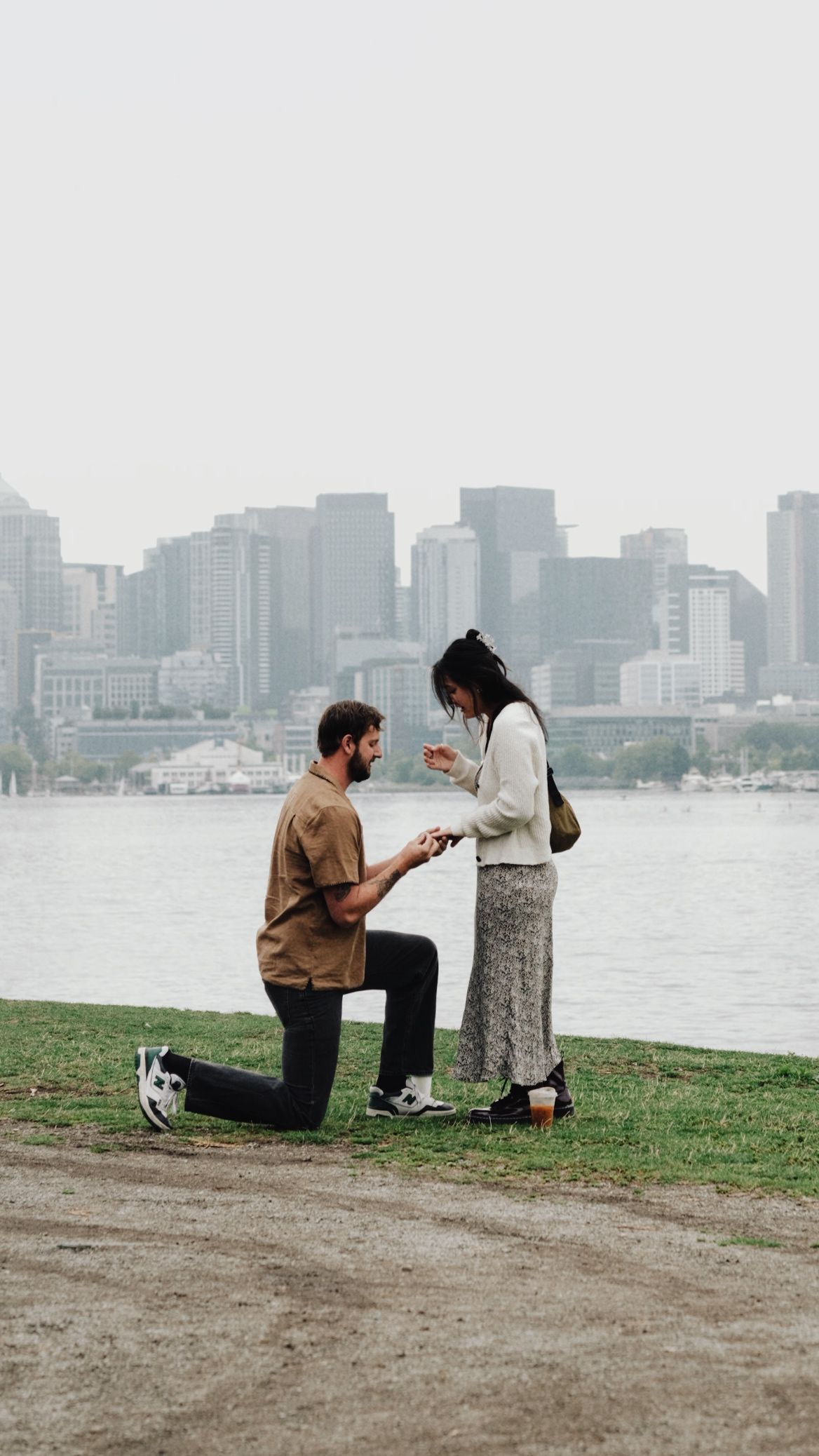 Moody engagement photos in Seattle, Washington at Gas Works Park on a foggy morning with film.