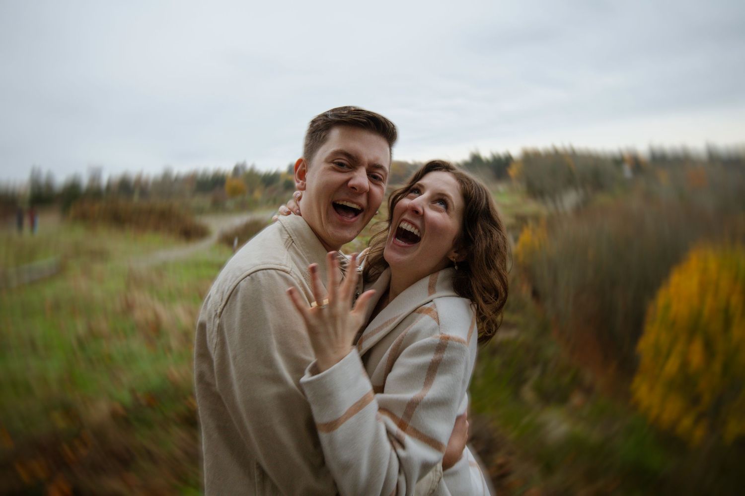 Fun engagement photos near Seattle, Washington on Lake Washington during the fall.