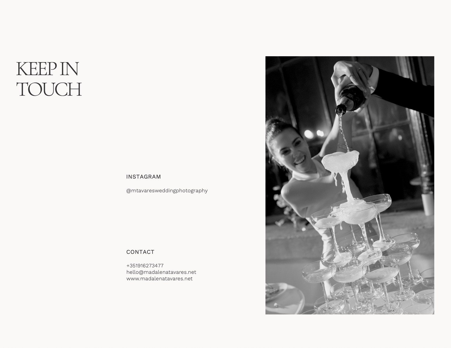 Black and white photo of champagne being poured into a tower of glasses at an elegant wedding reception.