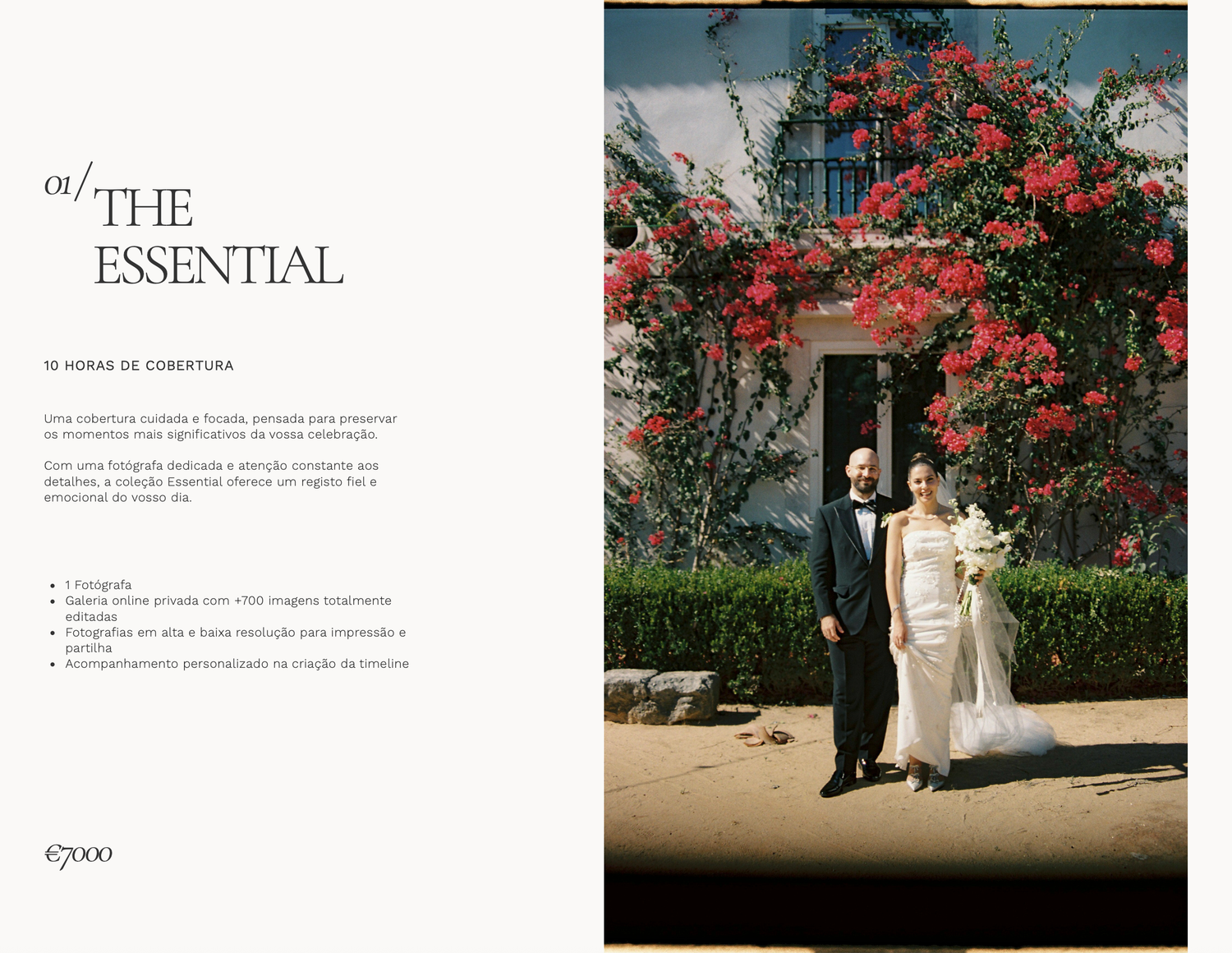 Elegant couple poses before a vibrant red floral wall at an outdoor wedding venue, bride in white gown.