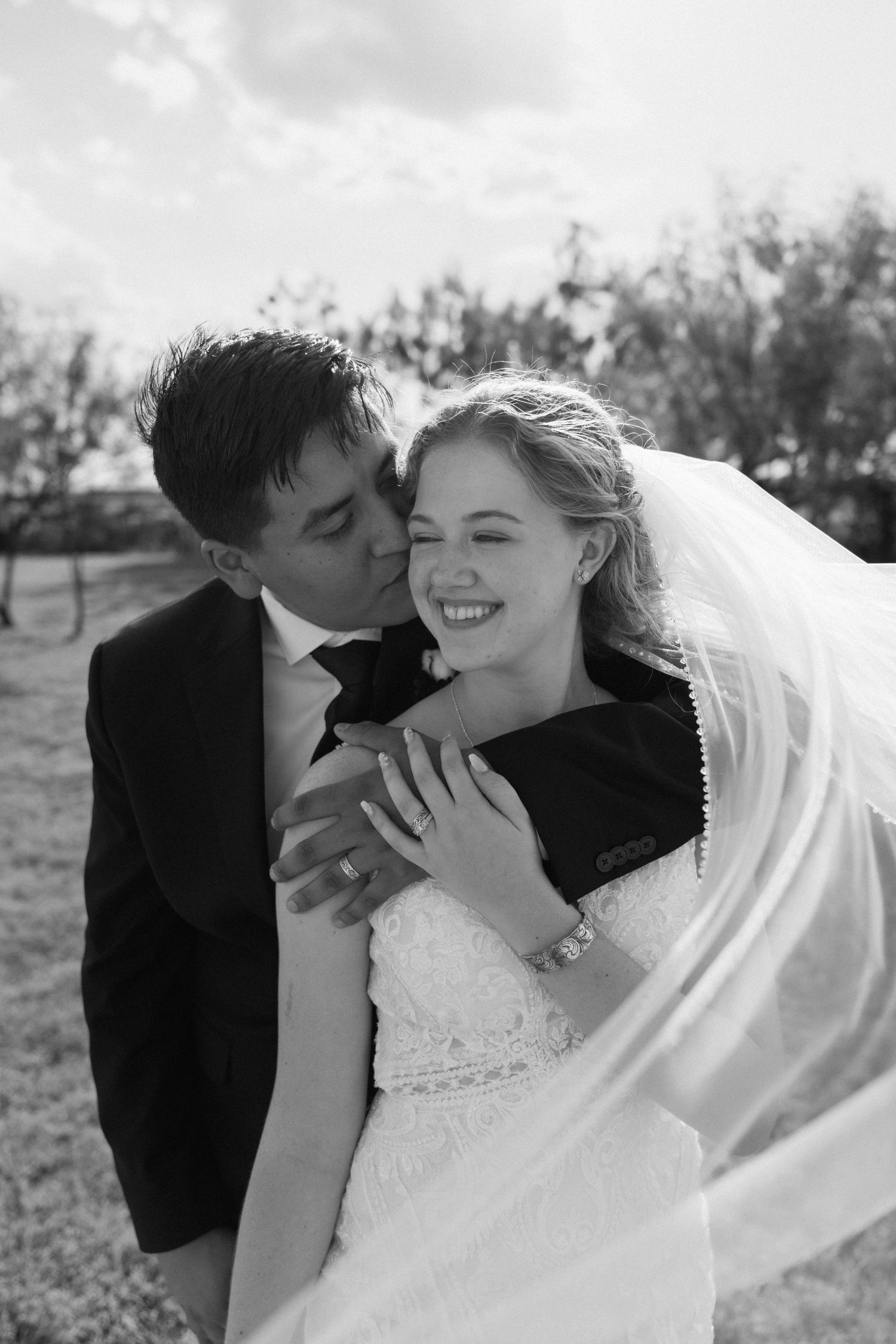 Black and white moments of sweet wedding couple in Abilene, Texas