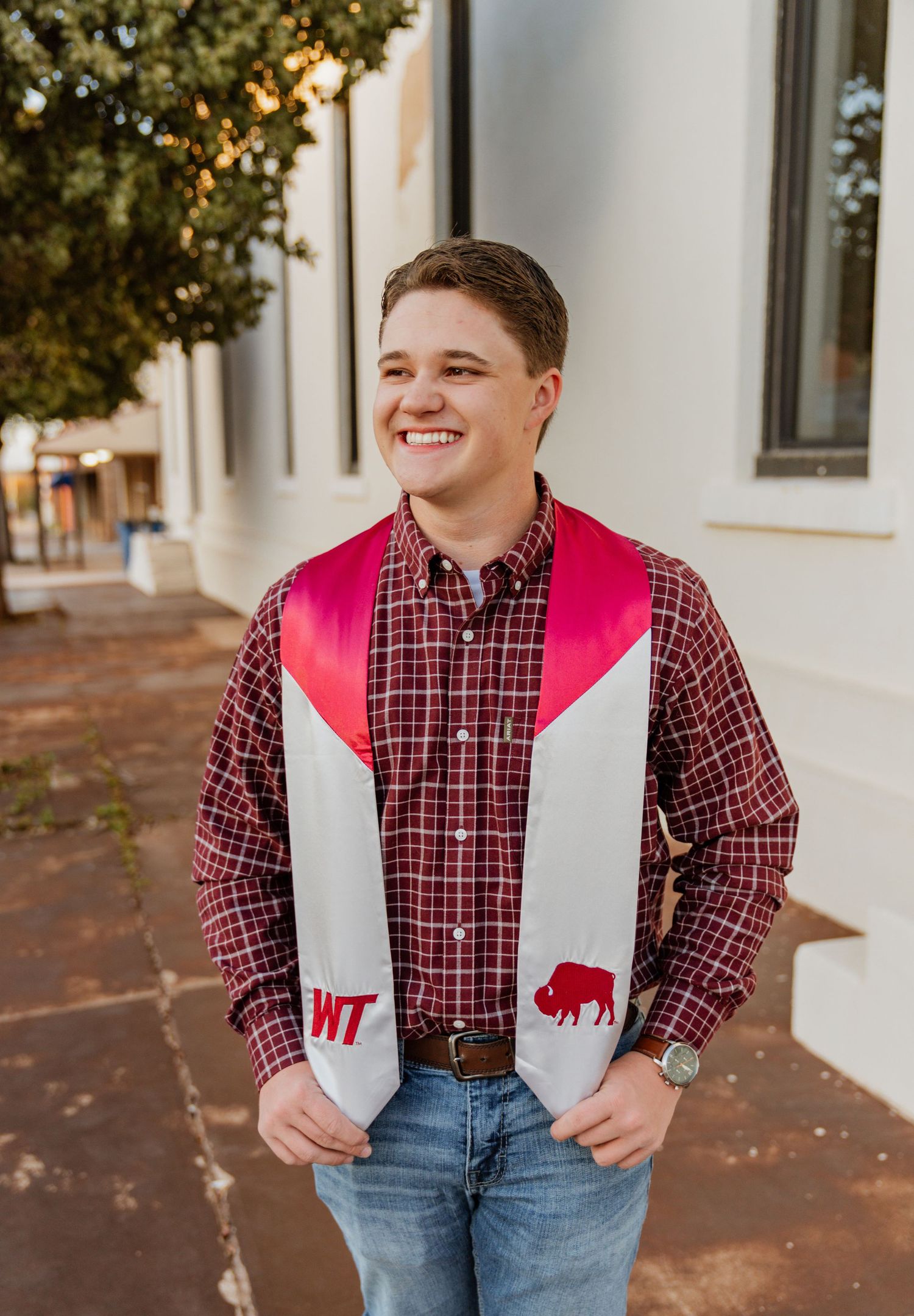College graduate session at golden at hour in Sweetwater, Texas