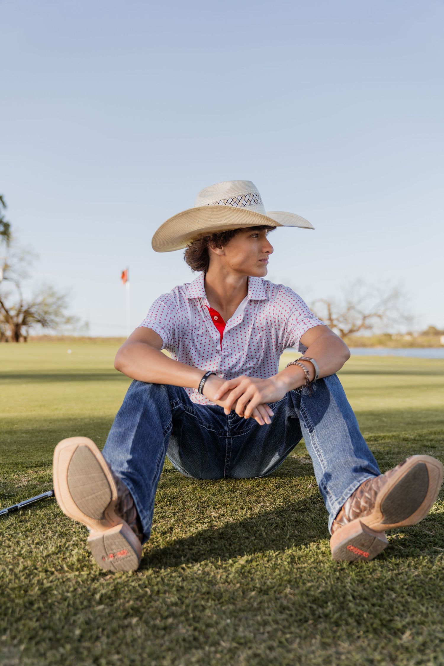 Senior/Graduate session at a golf course at sunset in Abilene, Texas