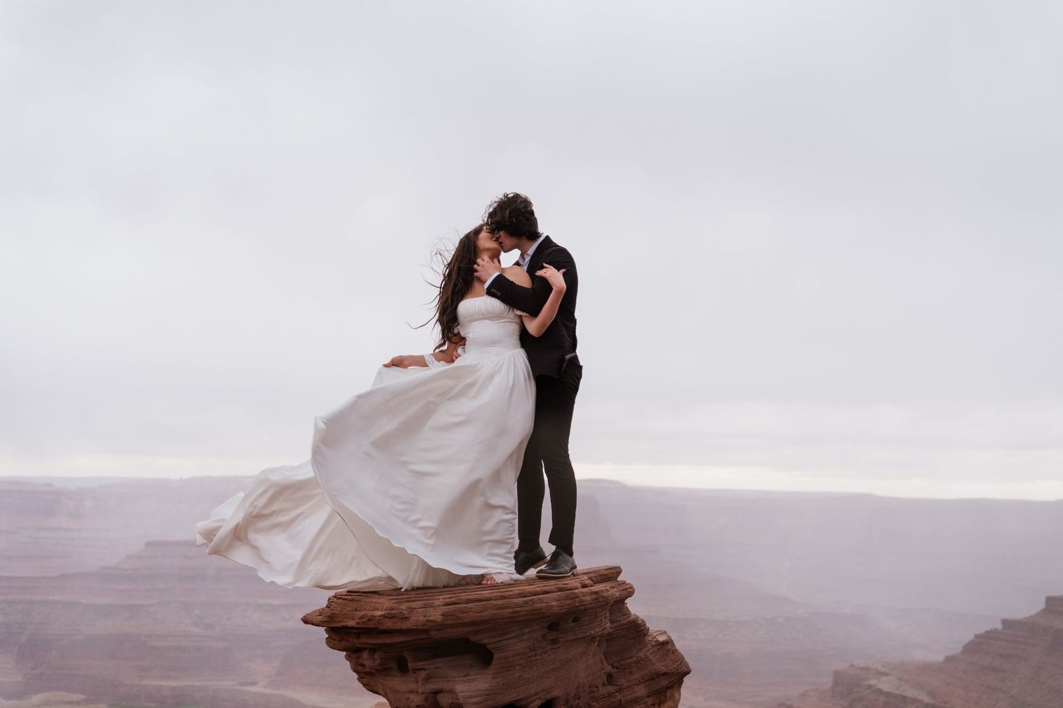 Elopement session at Moab, Utah at sunset