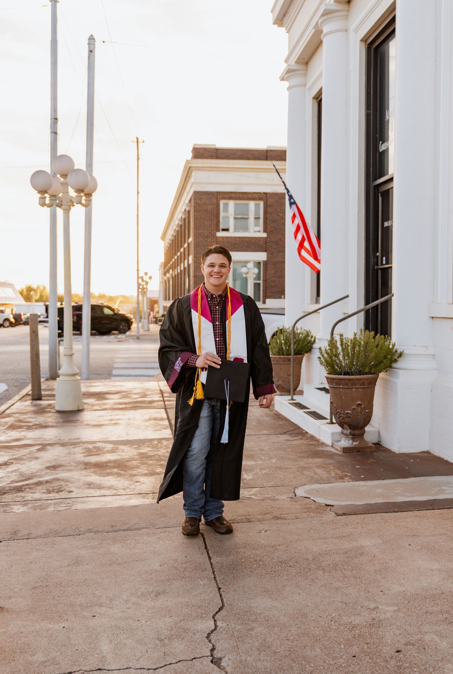 Golden hour graduate session in the city in west Texas