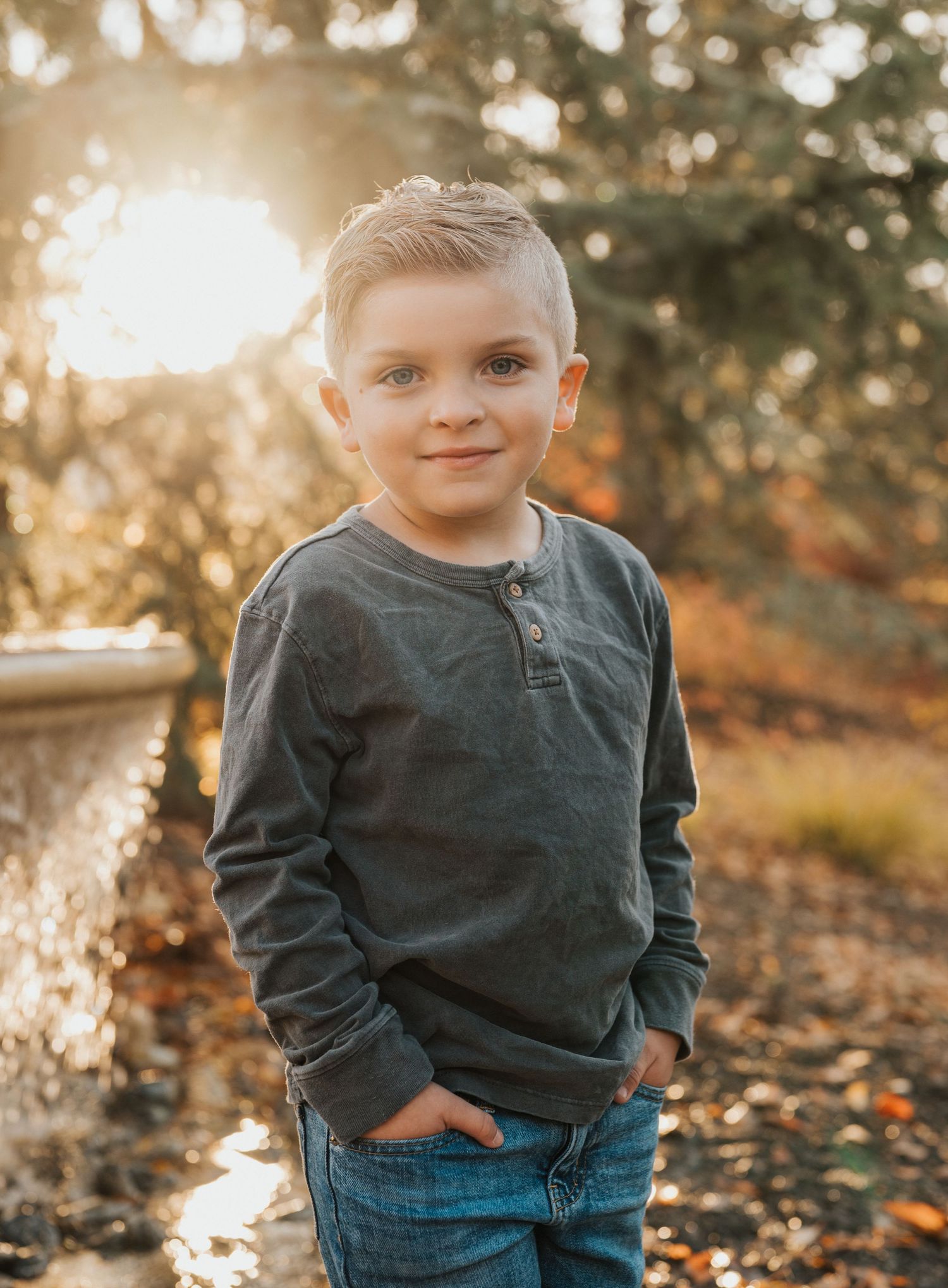 A portrait of a young boy at golden hour in the fall. Meridian, Idaho.