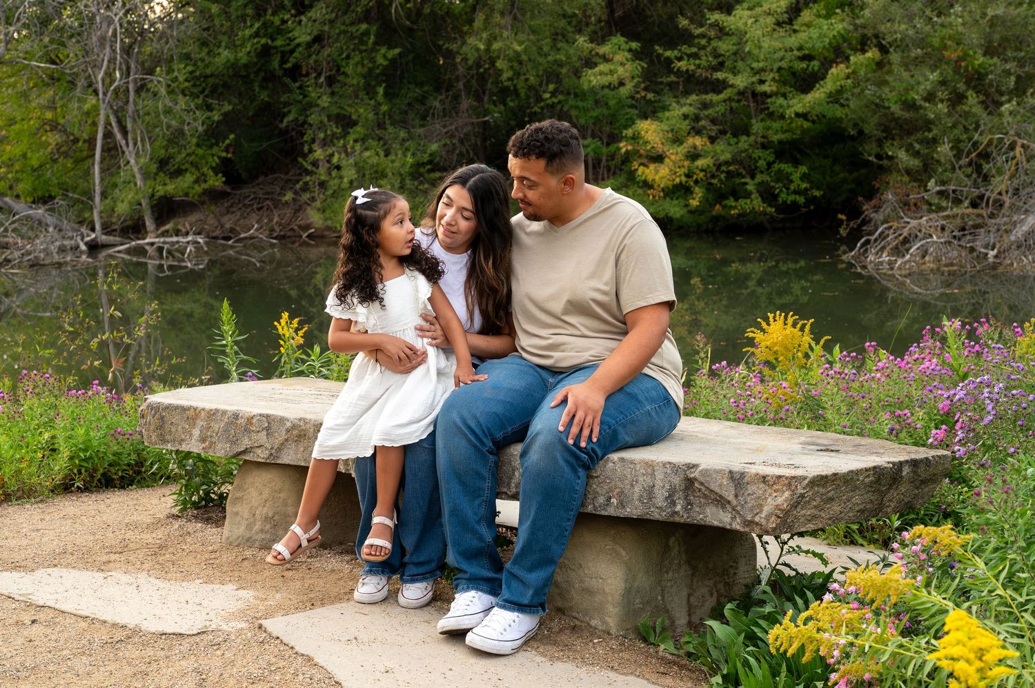 a family of 3 having an intimate moment together. Boise idaho