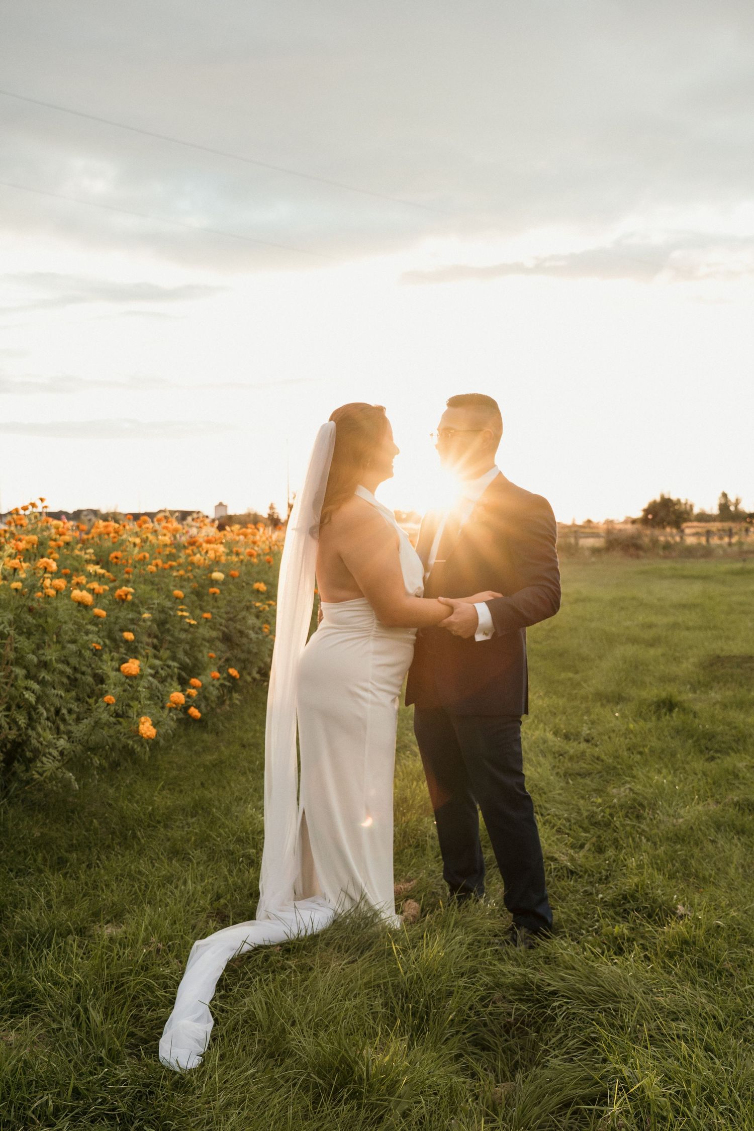 A beautiful sunset shot of a bride and groom at a flower farm in Eagle, Idaho.